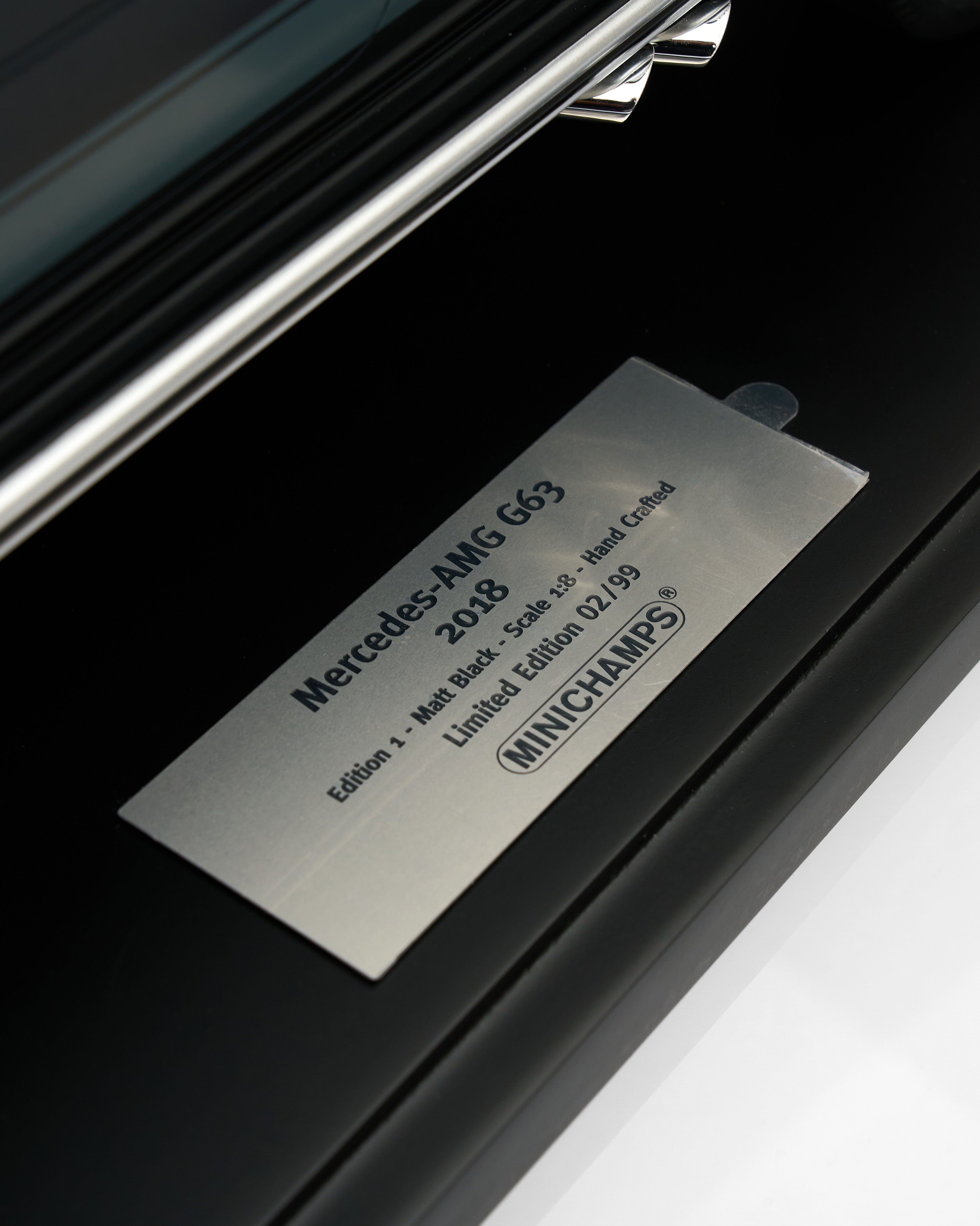 Mercedes-AMG G63 model information label on a car exterior