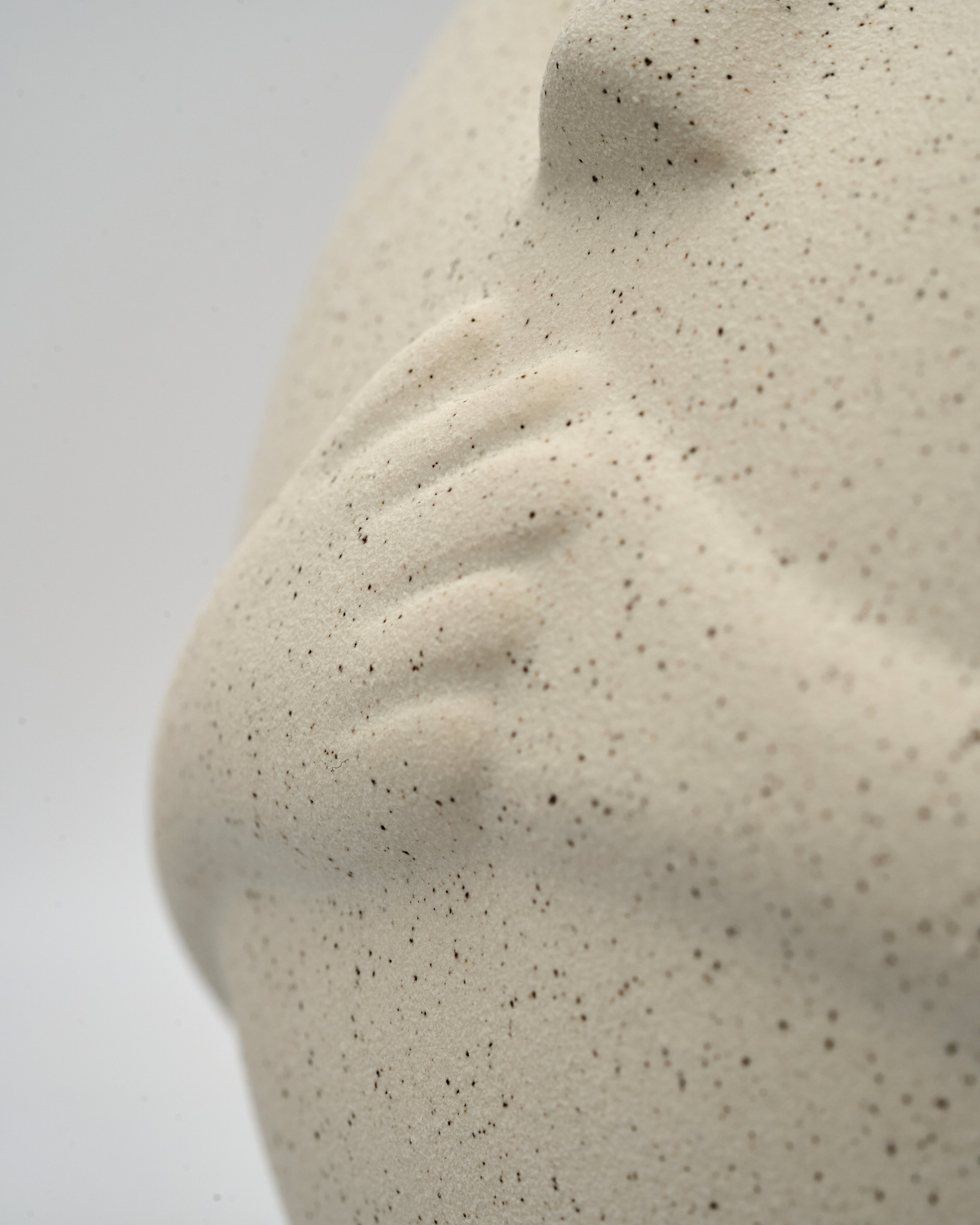 Detailed view of Minimalist Three Virtues sculpture emphasizing fine contours and luxury decorative finish