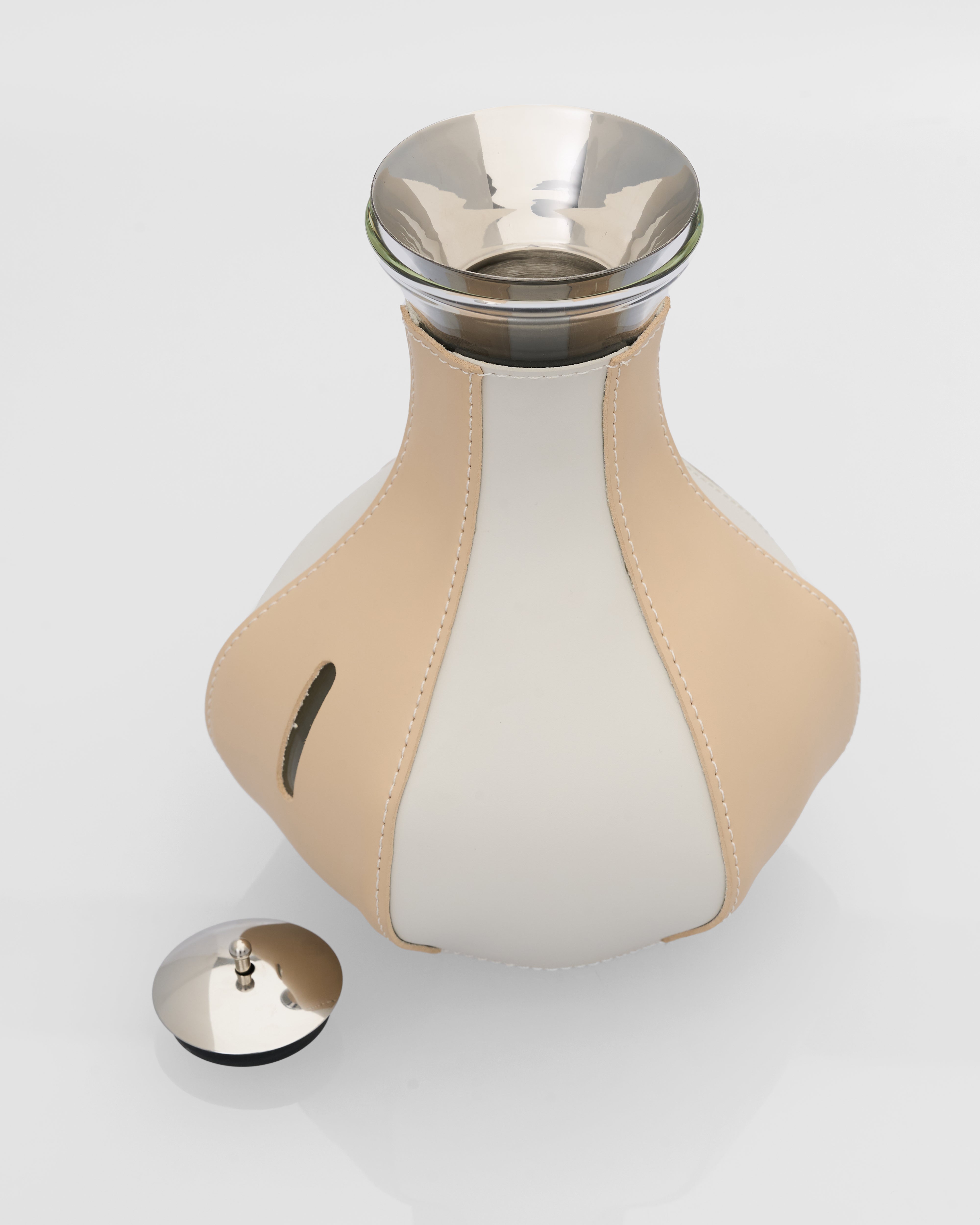 Close-up of Modern Leather Accent Jug Decor revealing fine leather texture and meticulous craftsmanship