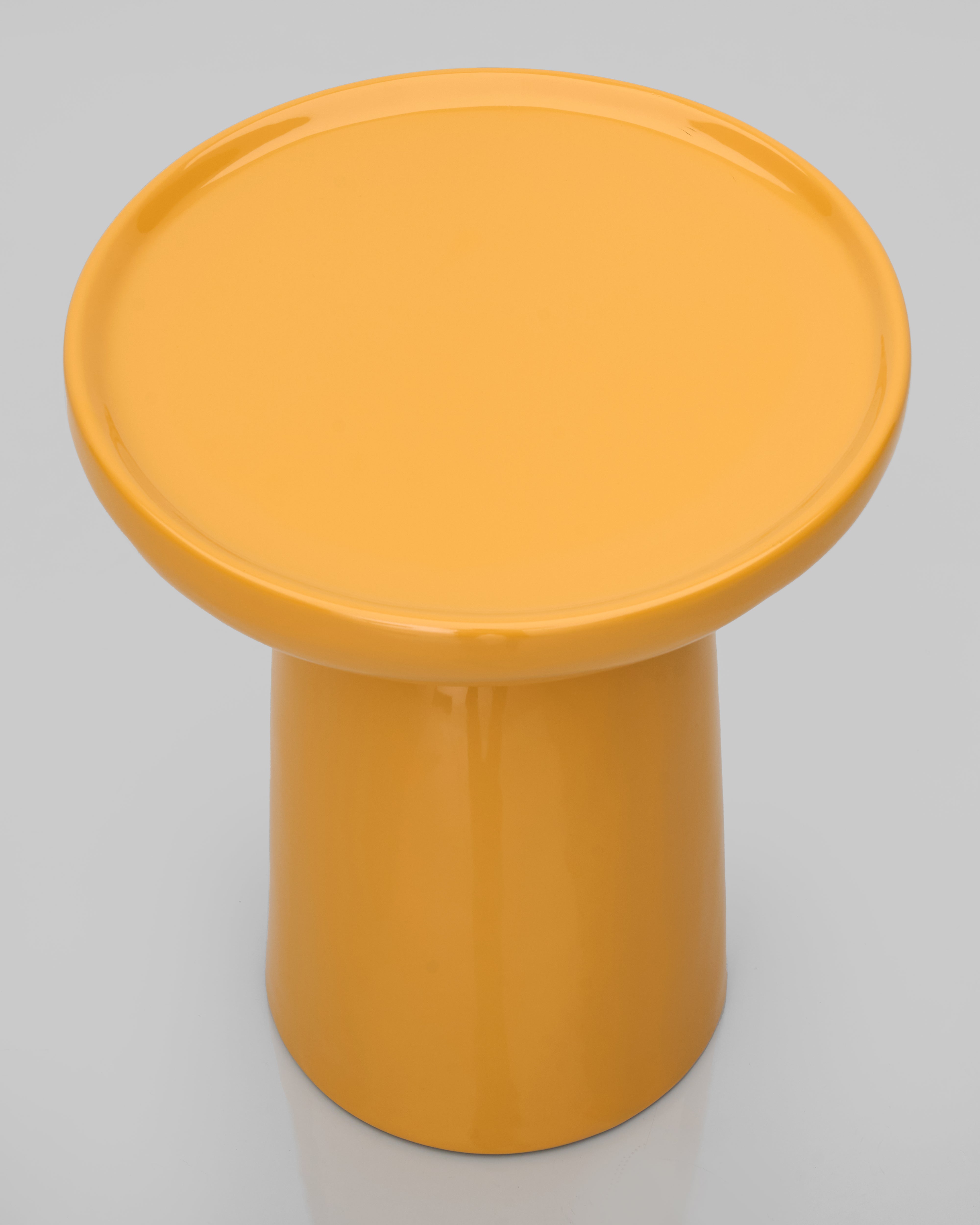 Side view of Mushroom Accent Side Table highlighting elegant mushroom-inspired shape and functional tabletop