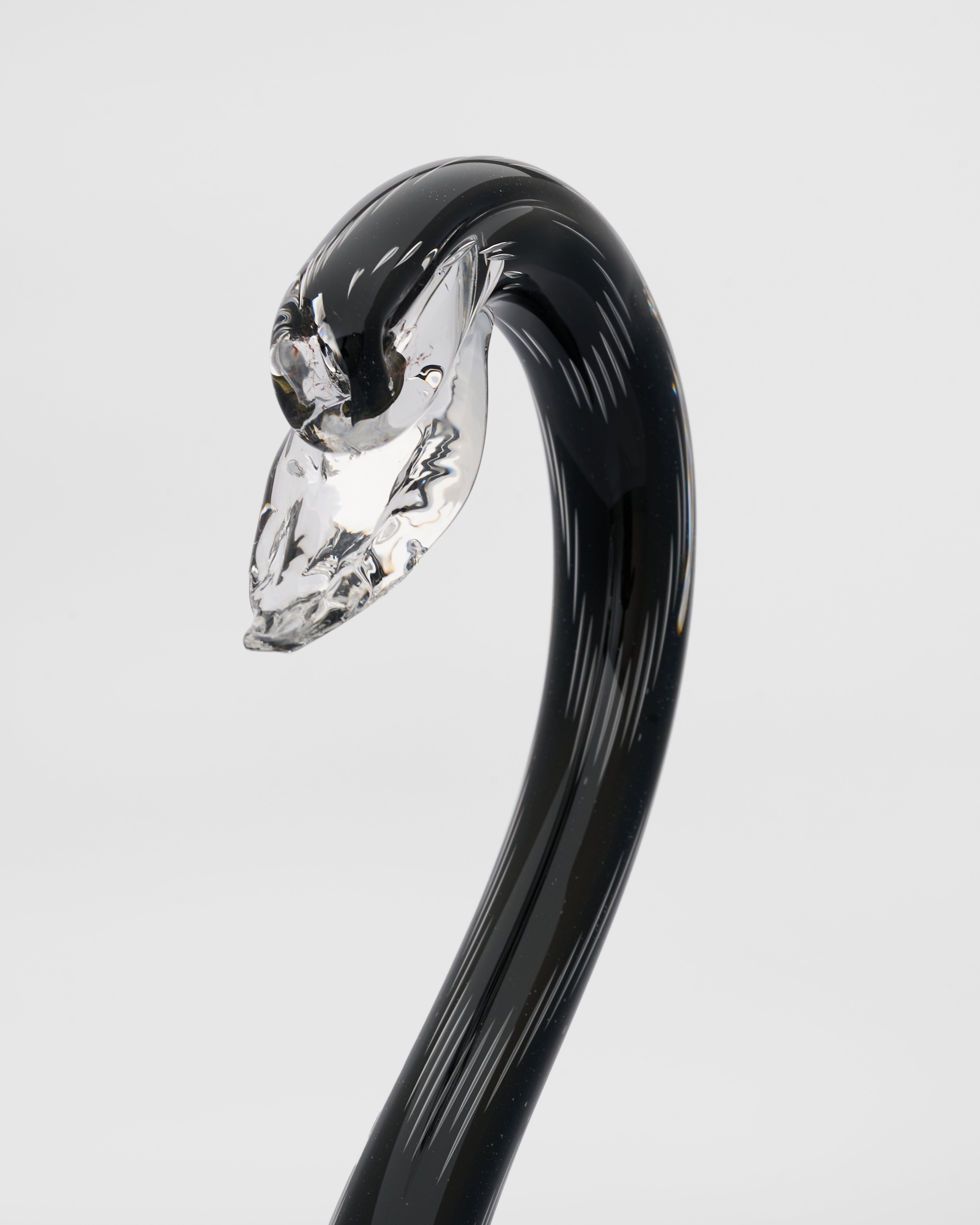 Front view of Nuvia Swan Decor showcasing smooth glass finish and graceful swan form