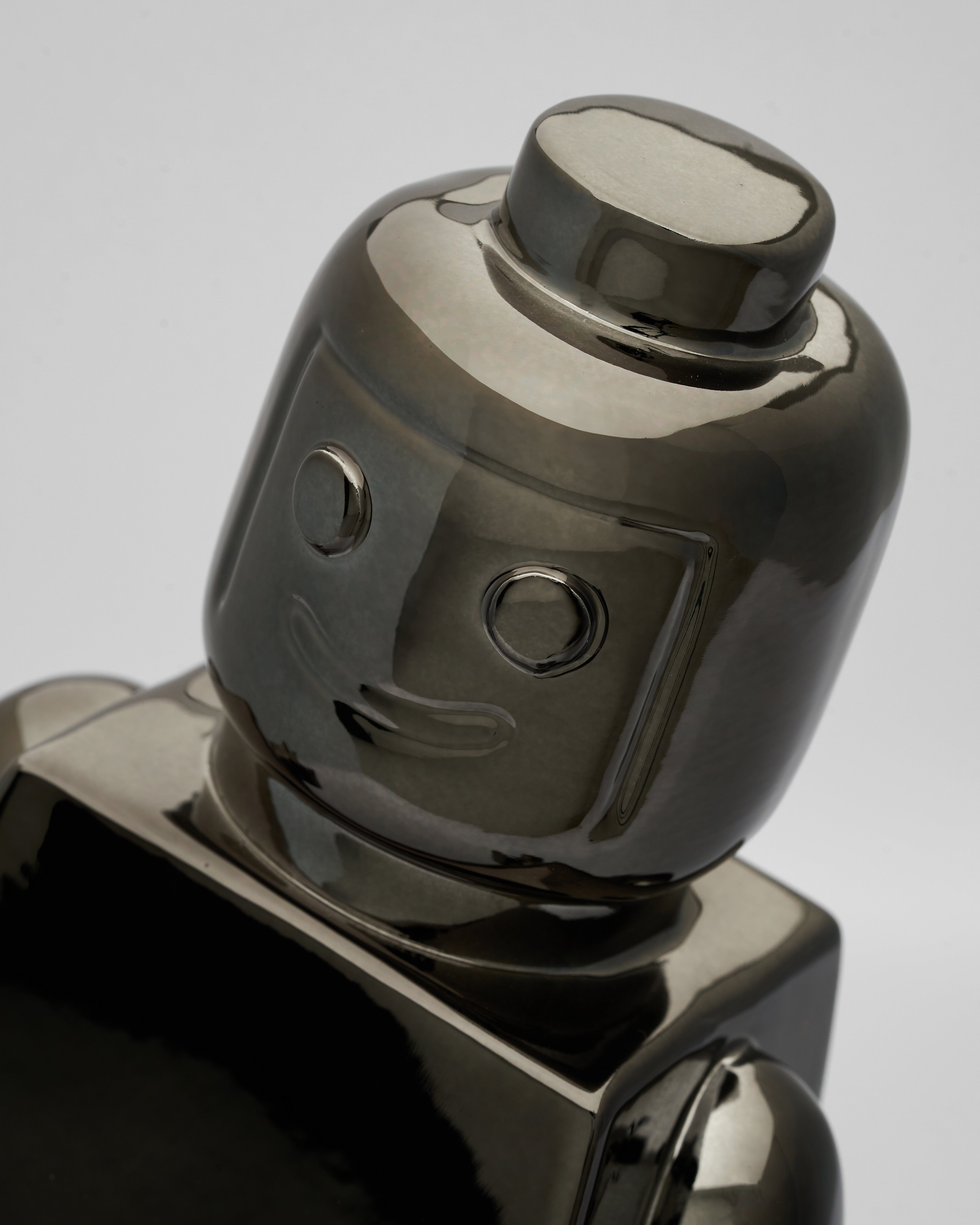 Detailed view of Slider Robo decor emphasizing sculptural contours and luxury futuristic finish