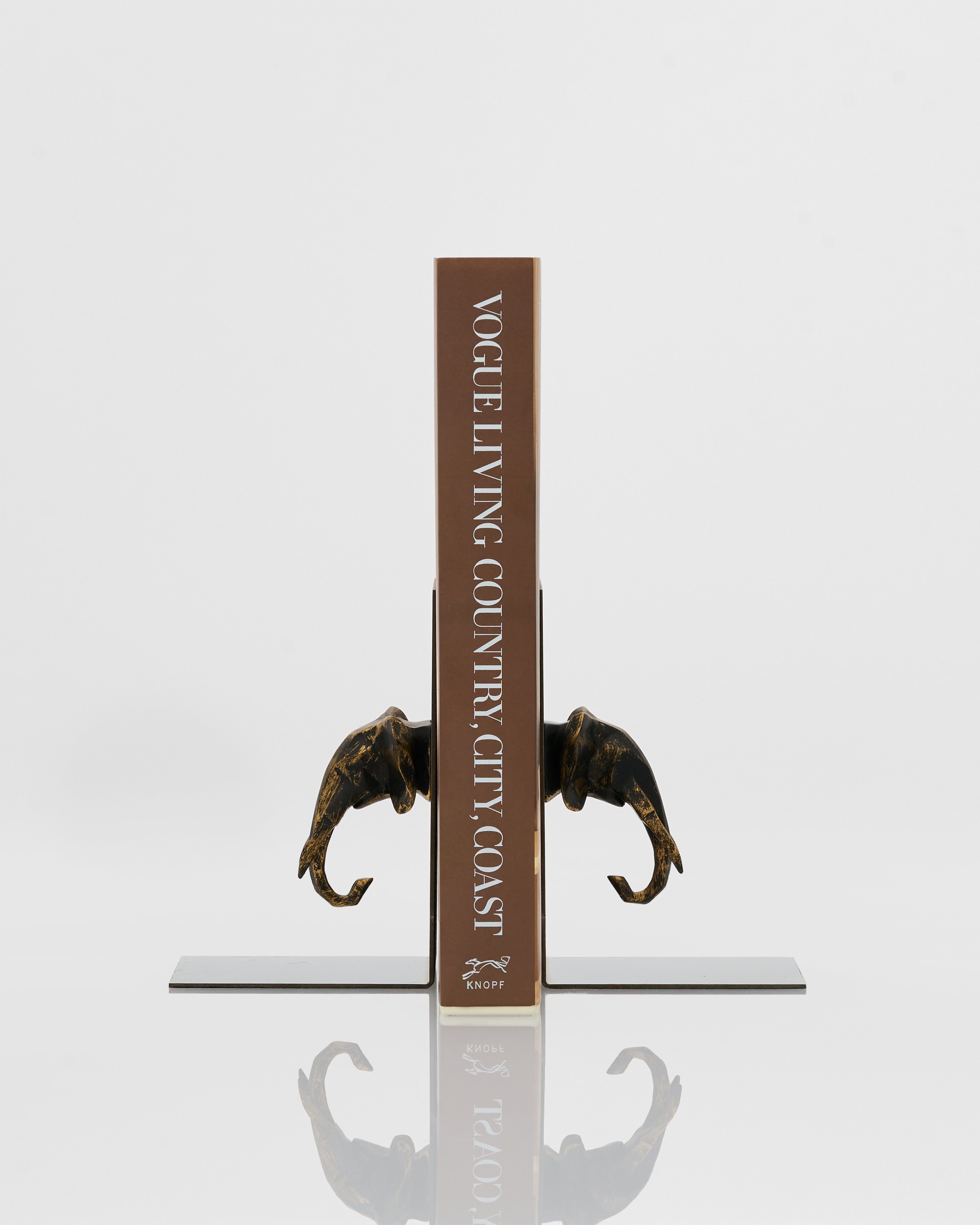 Symmetrical elephant bookend angled view showcasing artistic sculptural form and elegant design