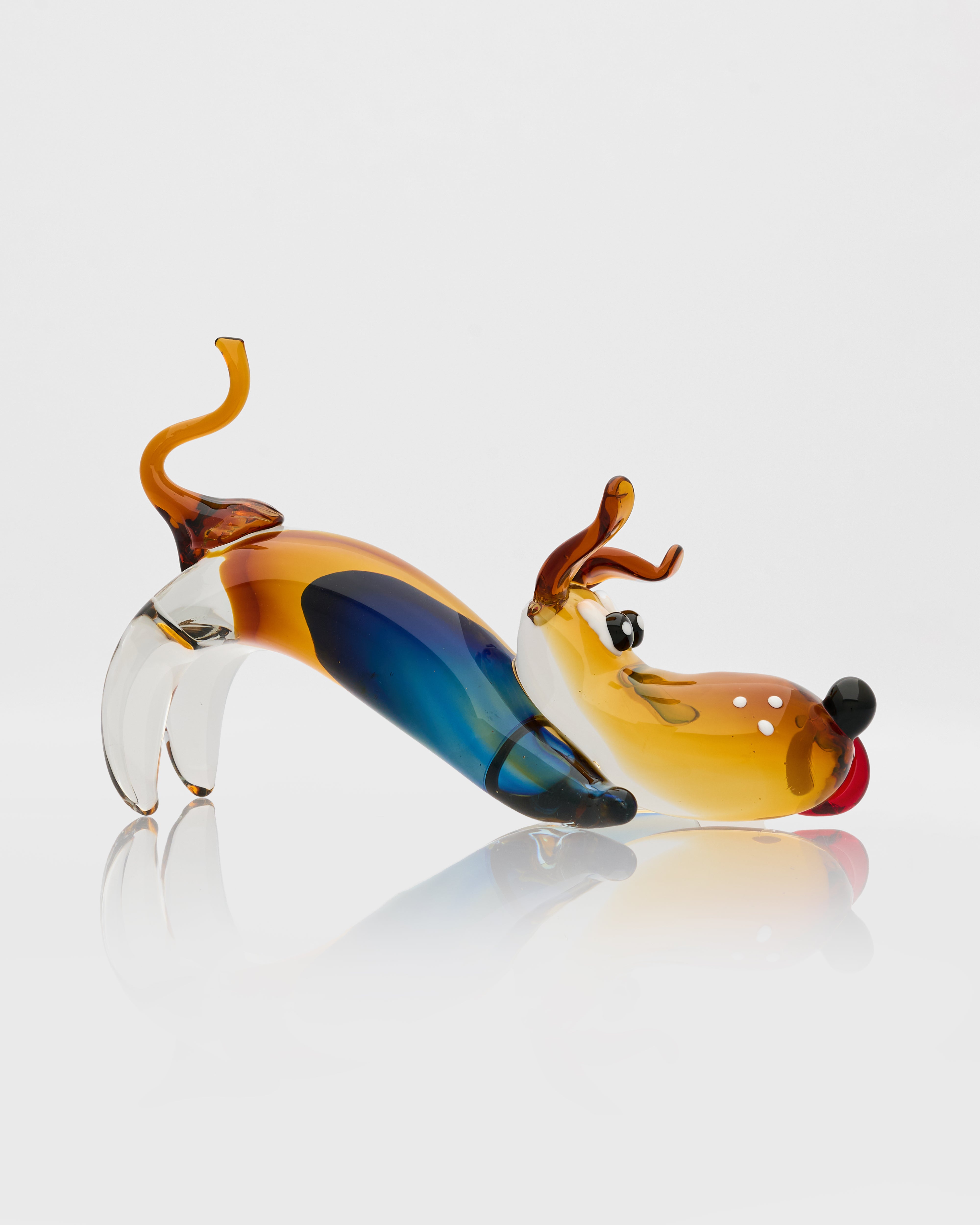 Glass reindeer figurine on a white background