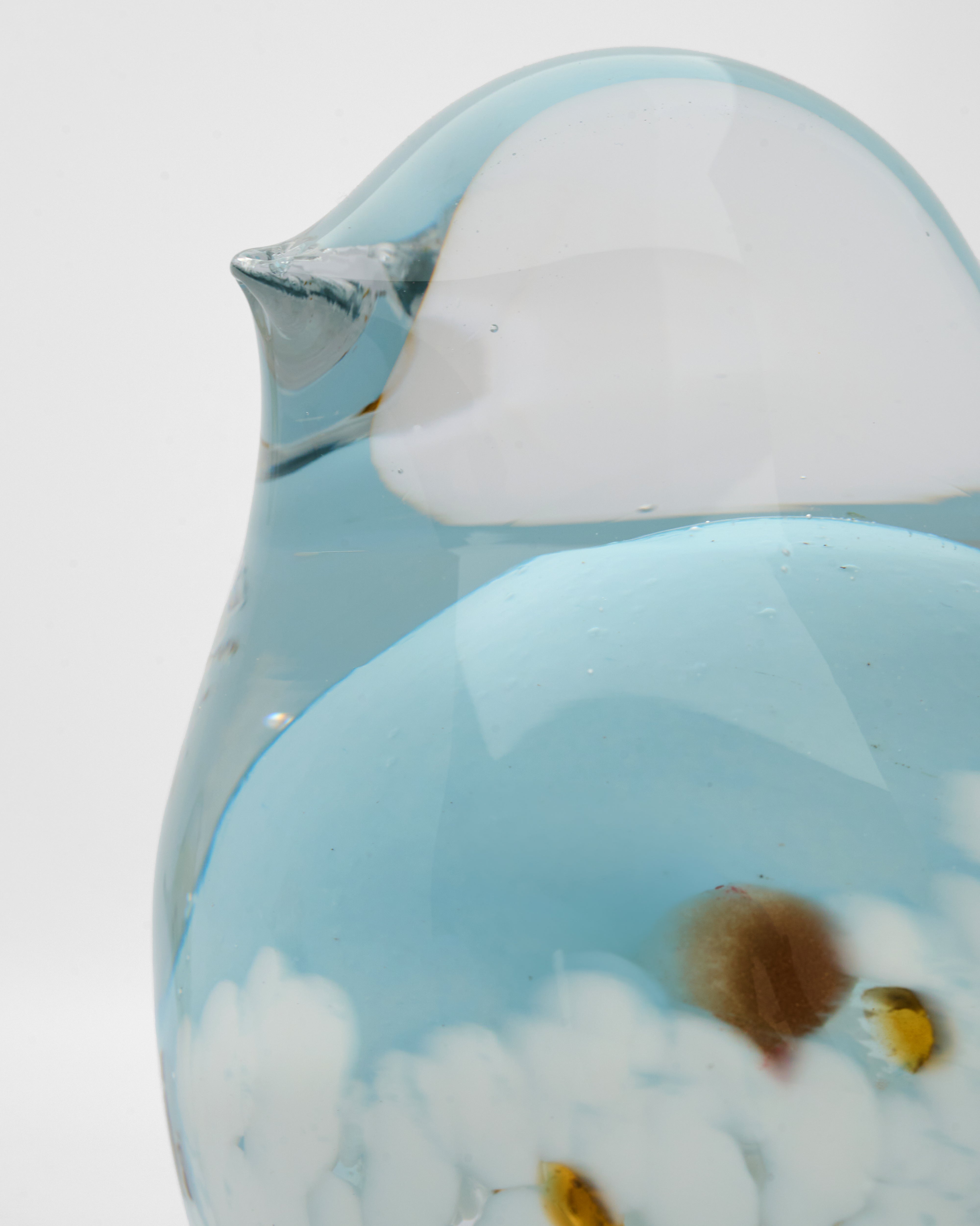 Close-up of triplets birds decor detailing premium glass and resin textures with fine craftsmanship