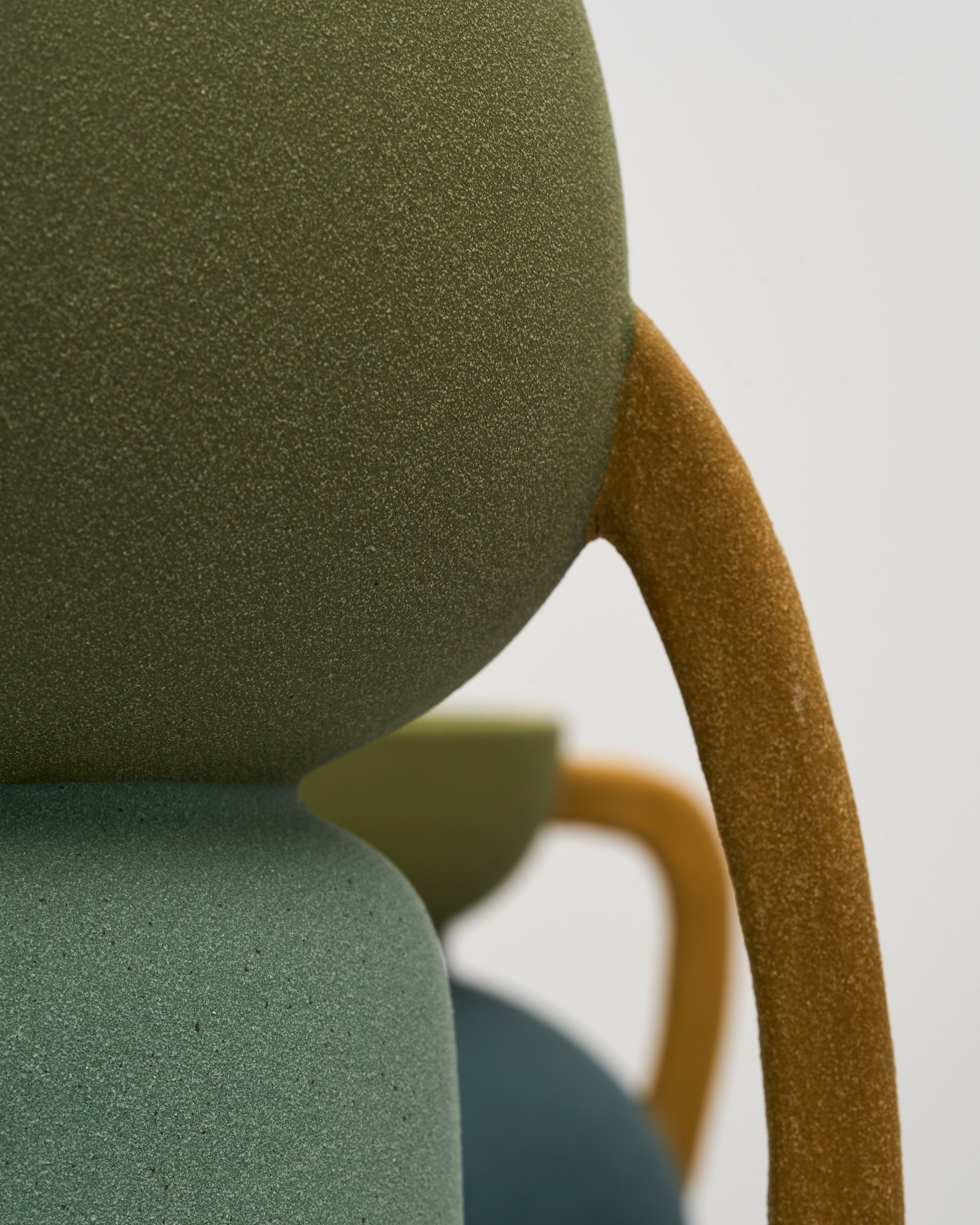 Close-up of tumbler form ceramic decor highlighting fine ceramic texture and elegant finish