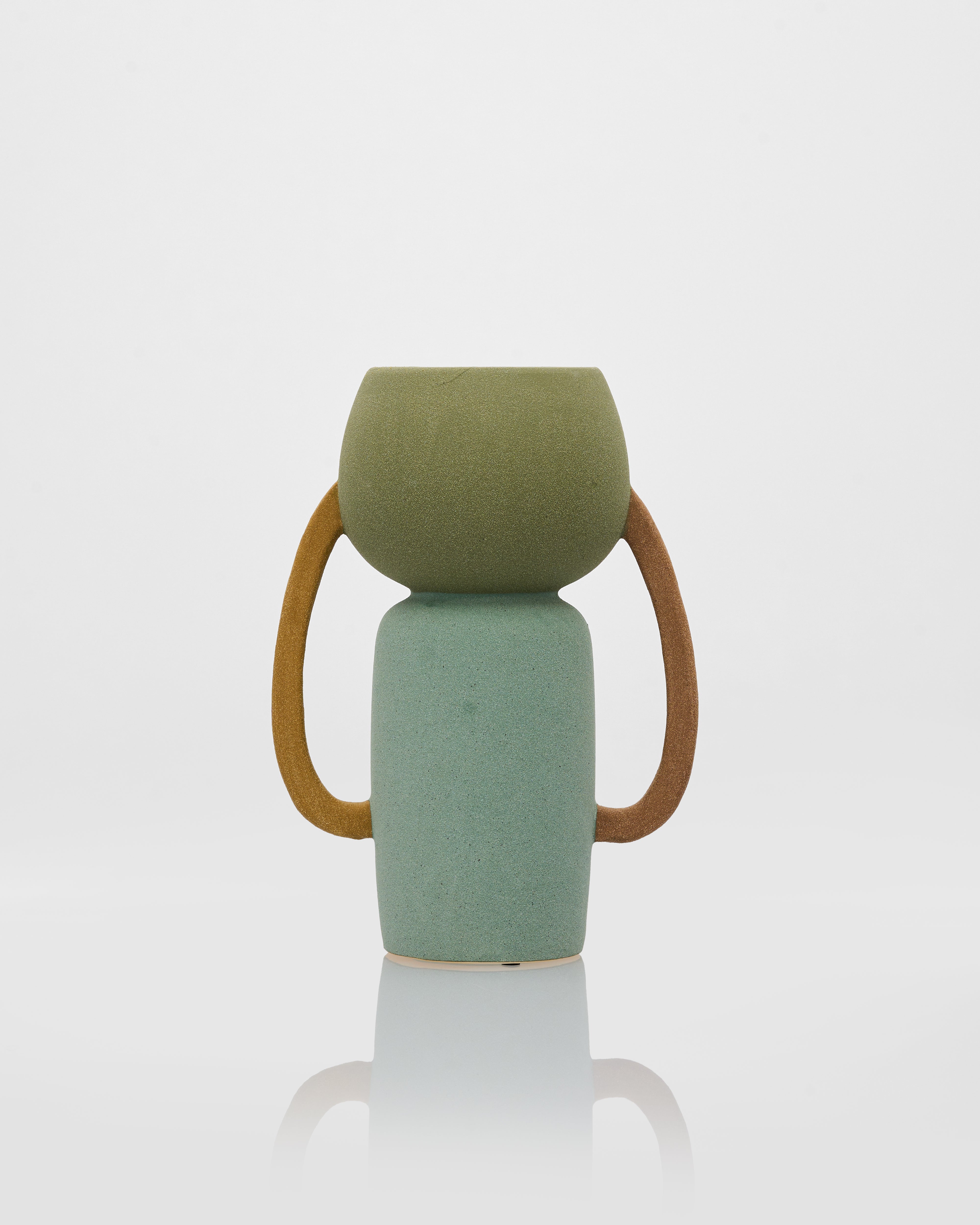 Detailed view of tumbler form ceramic decor emphasizing sculptural shape and premium craftsmanship