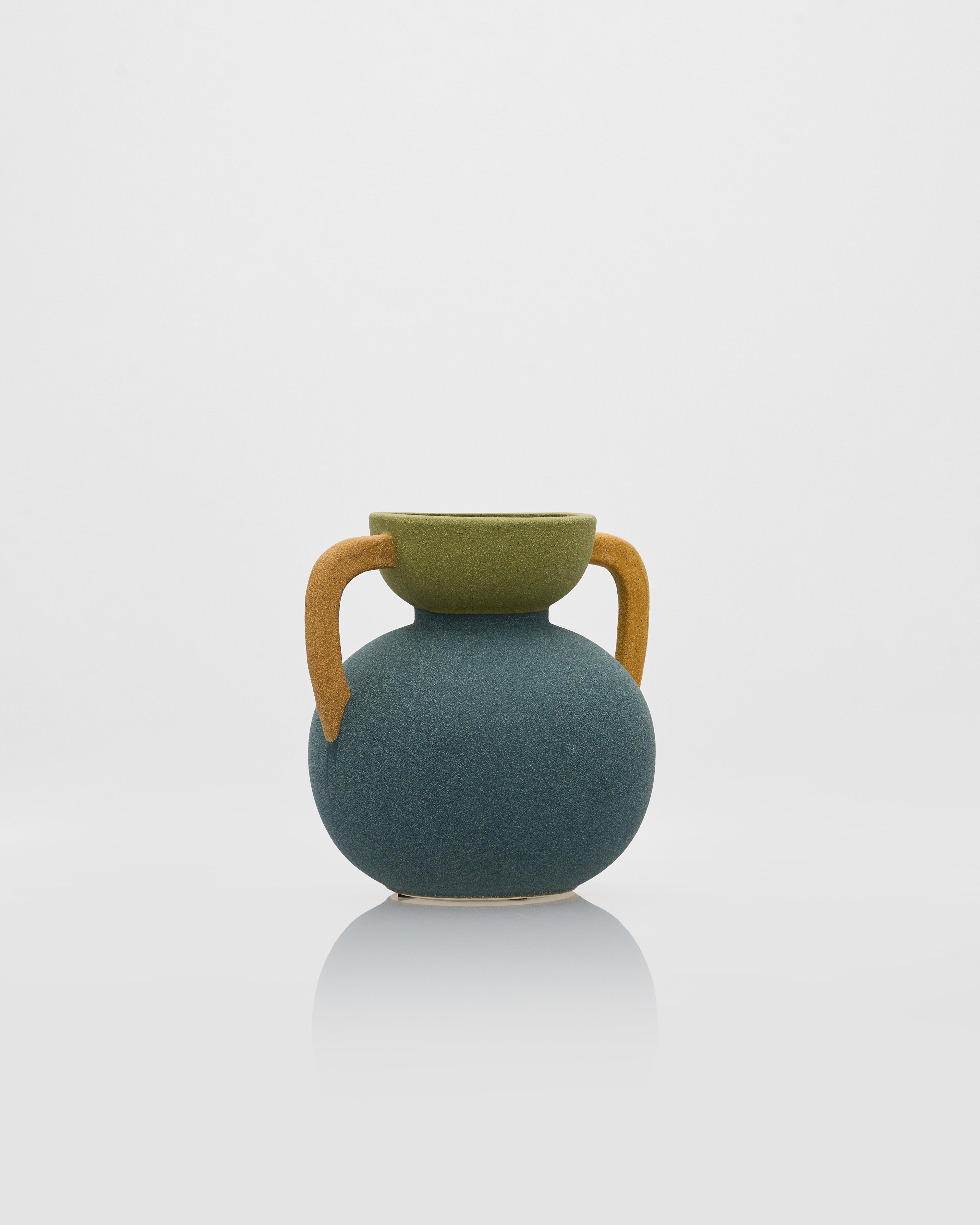Tumbler form ceramic decor styled as luxury accent piece for modern and elegant interiors