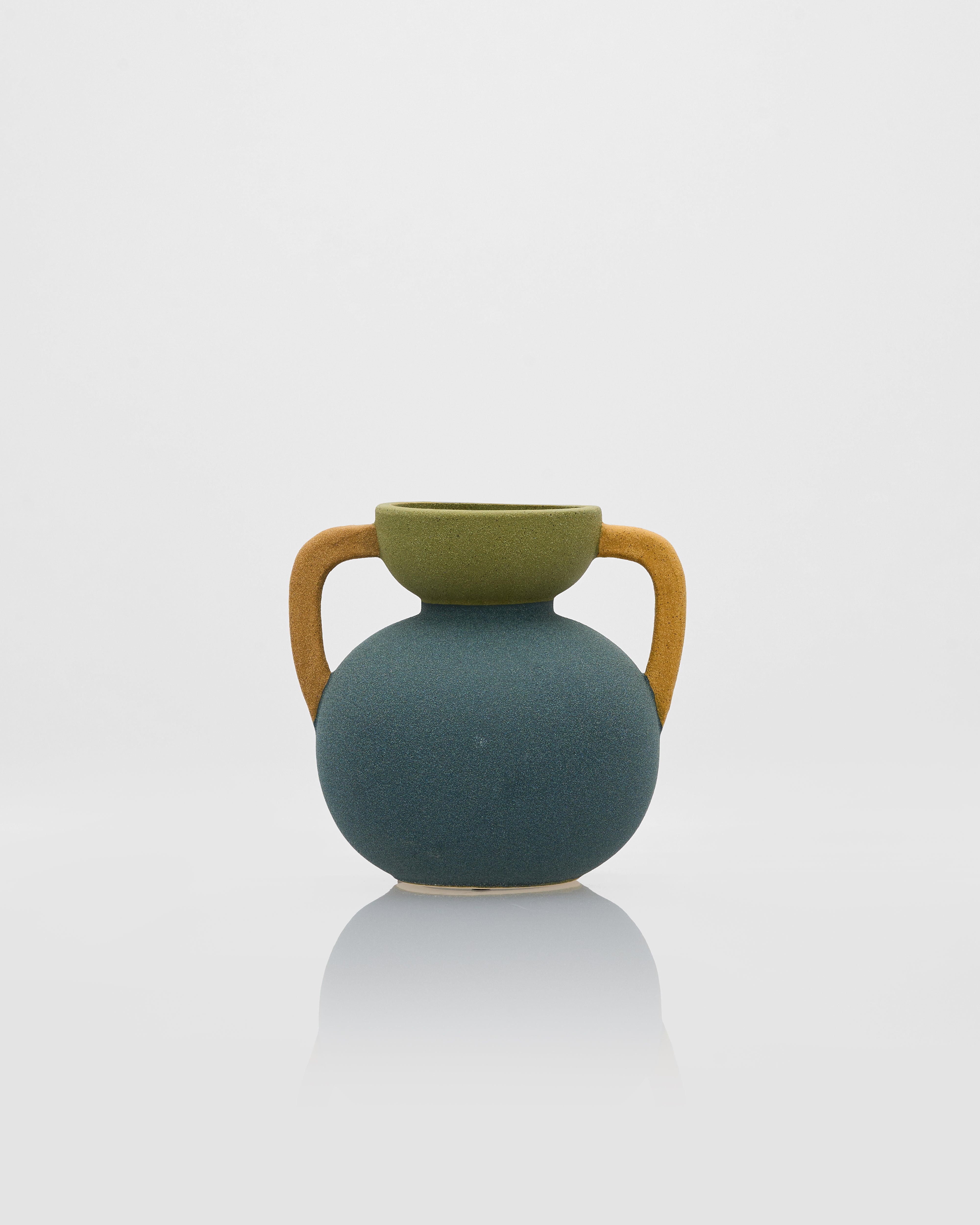 Tumbler form ceramic decor styled as luxury accent piece for modern and elegant interiors