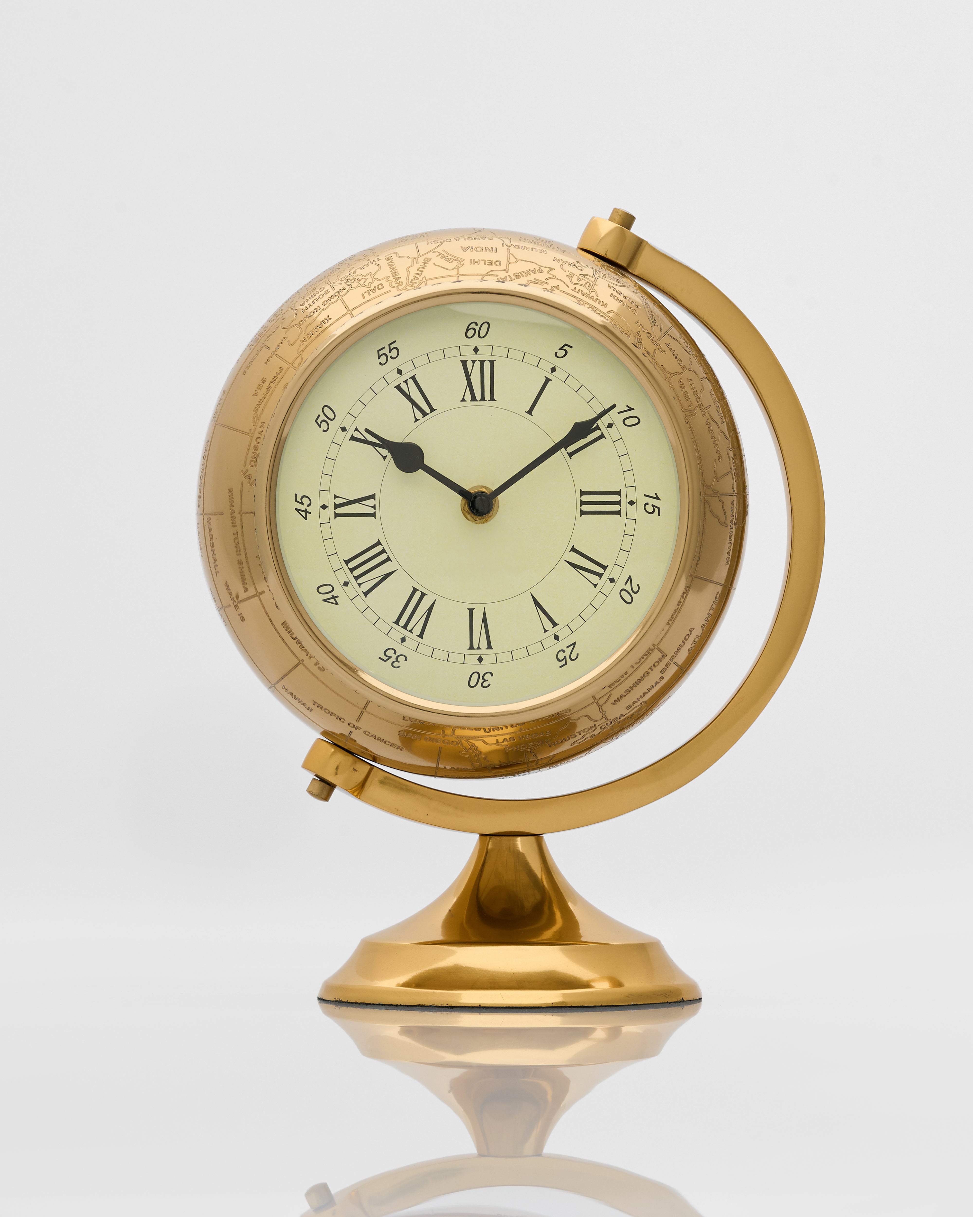 Gold clock with Roman numerals on a white background