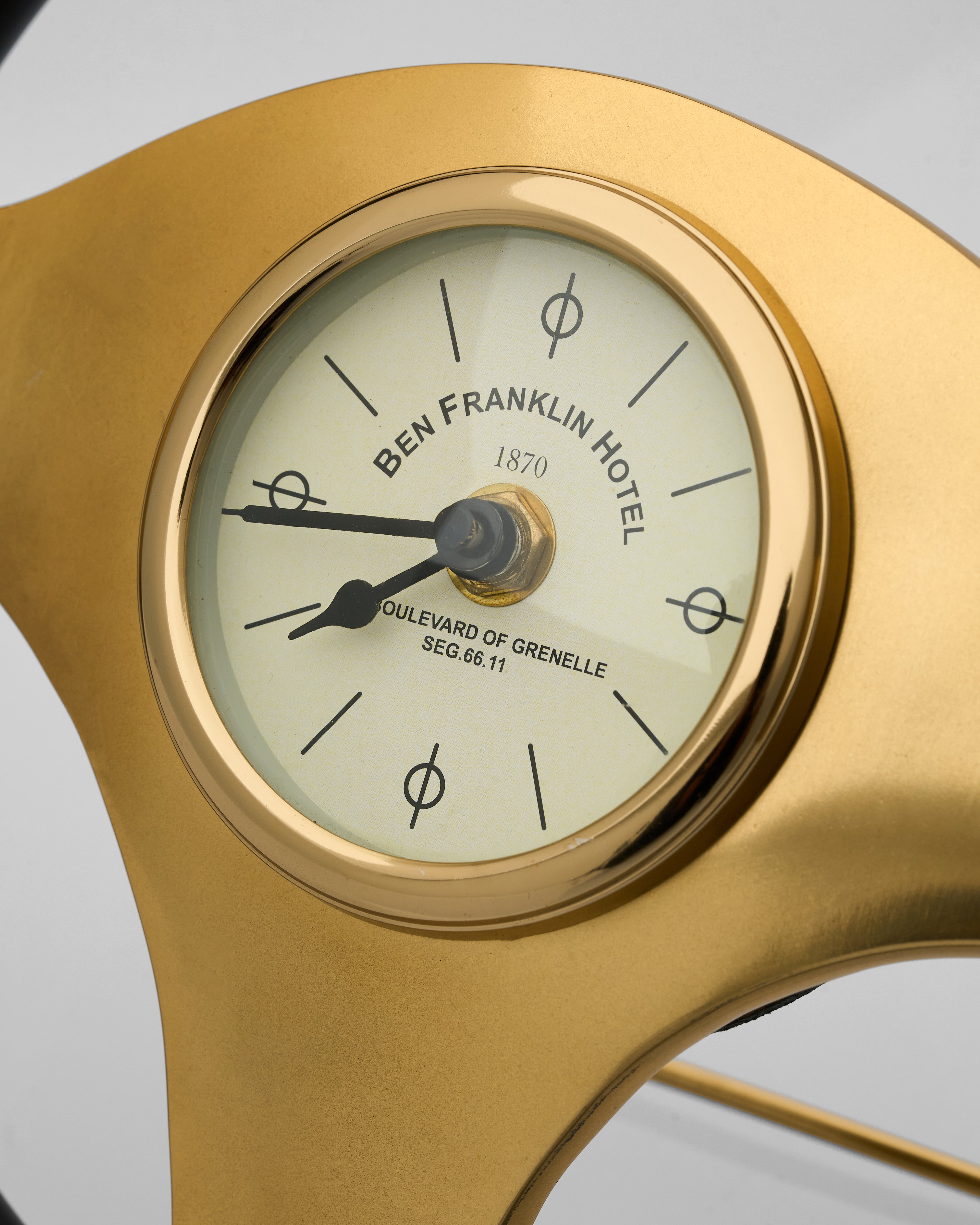 Close-up of vintage steering luxury table clock revealing fine textures and high-quality material craftsmanship