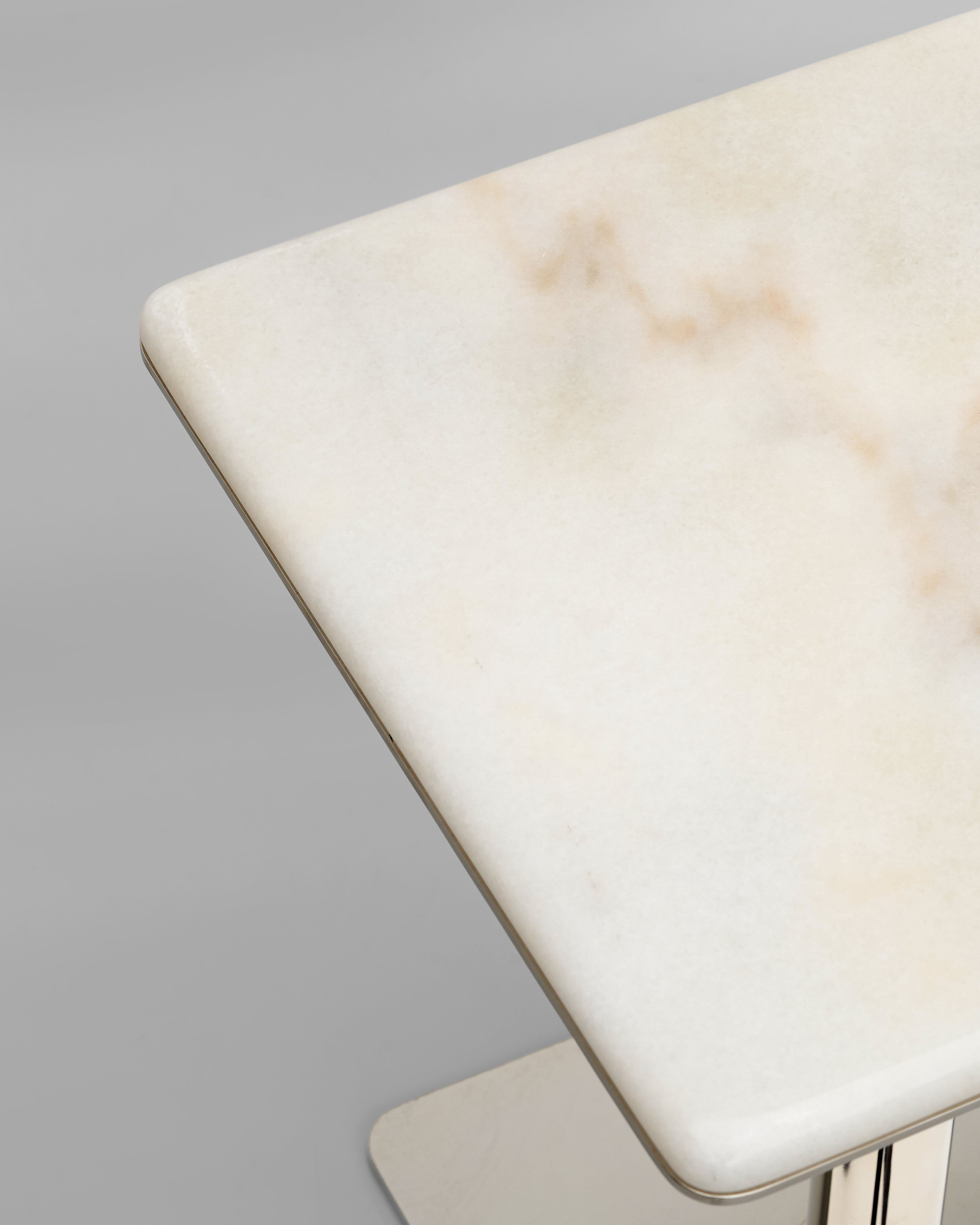 Detailed view of Voffo marble side table highlighting precision finishing and refined craftsmanship