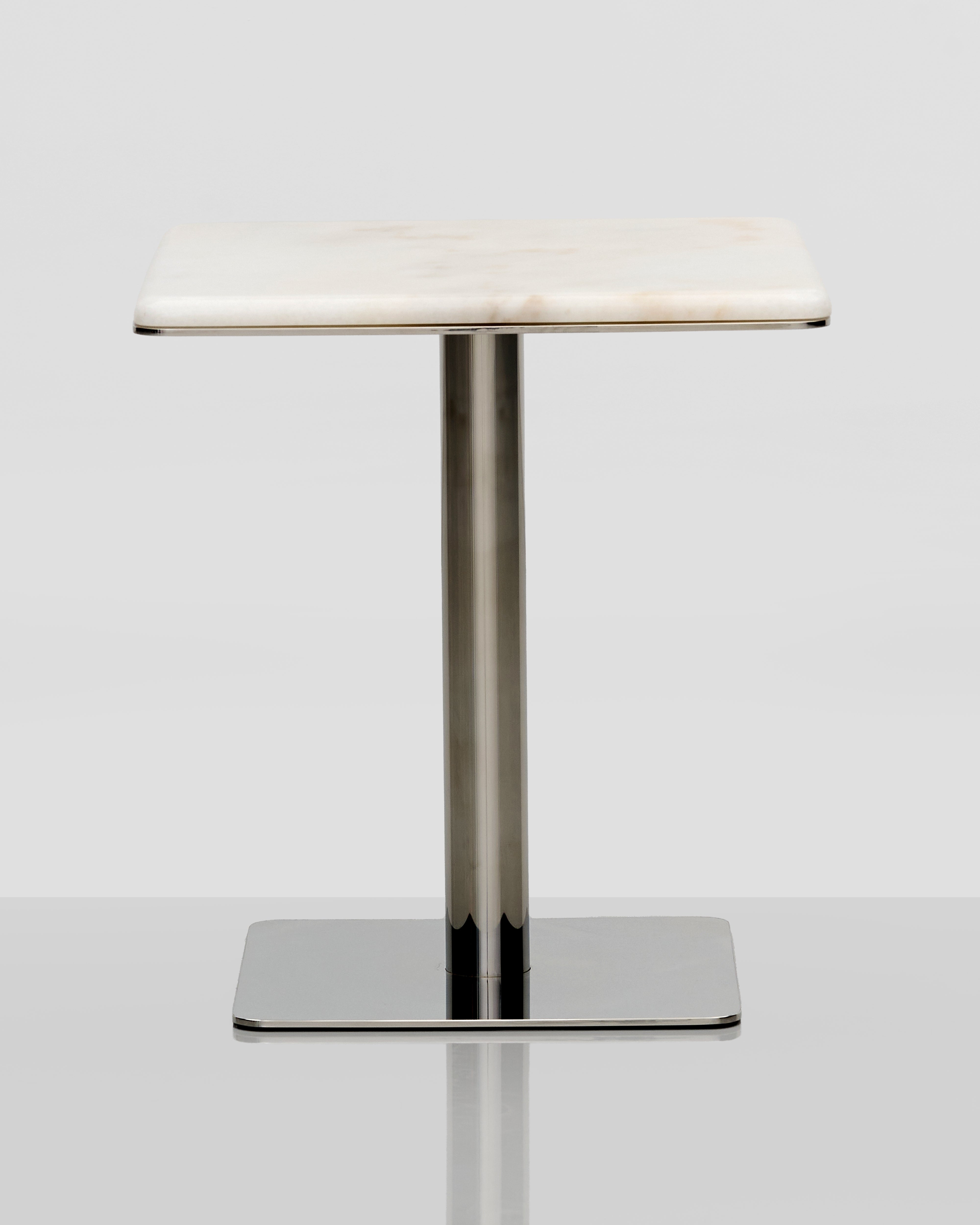 Front view of Voffo marble side table showcasing premium marble top and refined structure