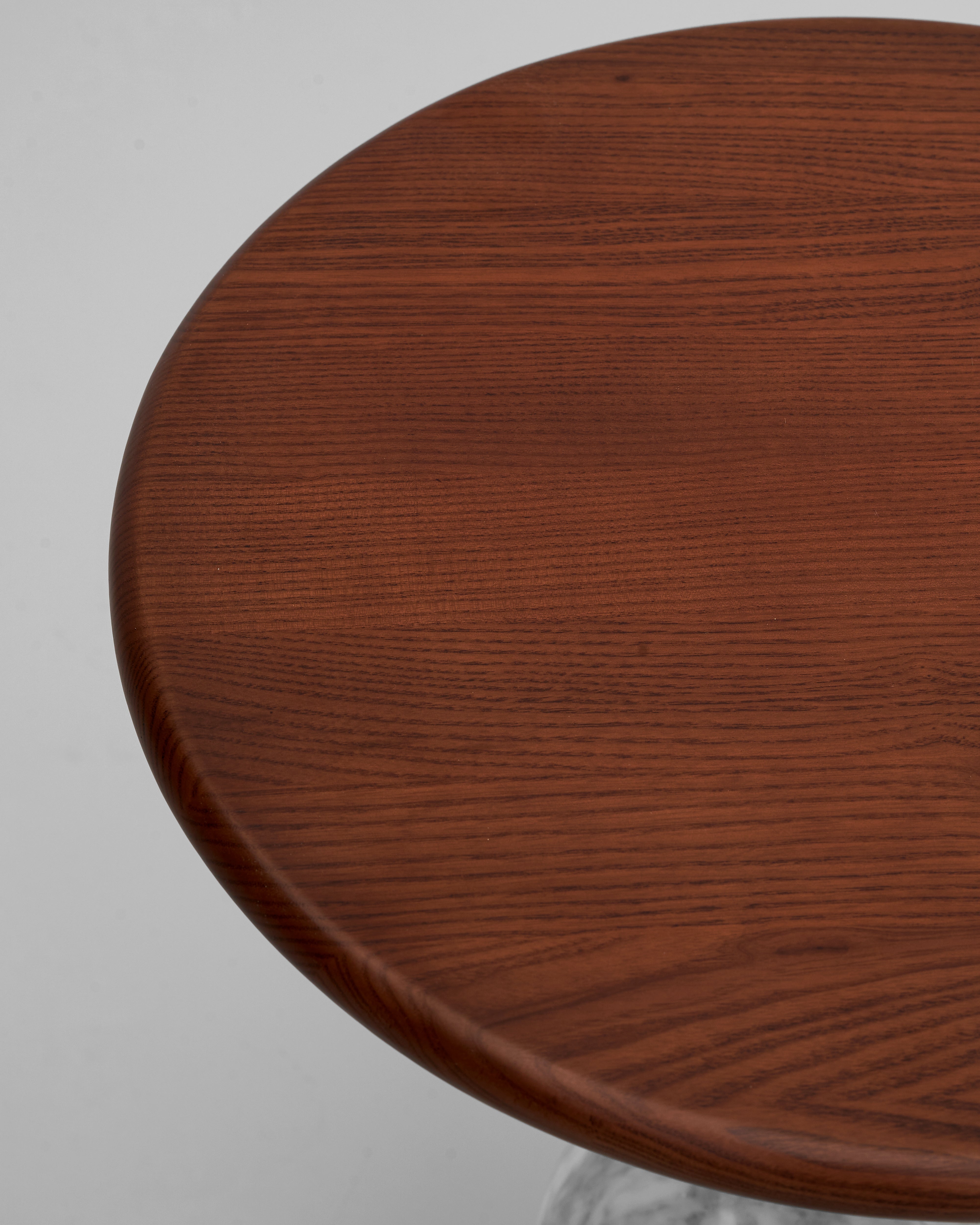 Close-up of wooden base on Zen designer side table highlighting premium wood grain and craftsmanship