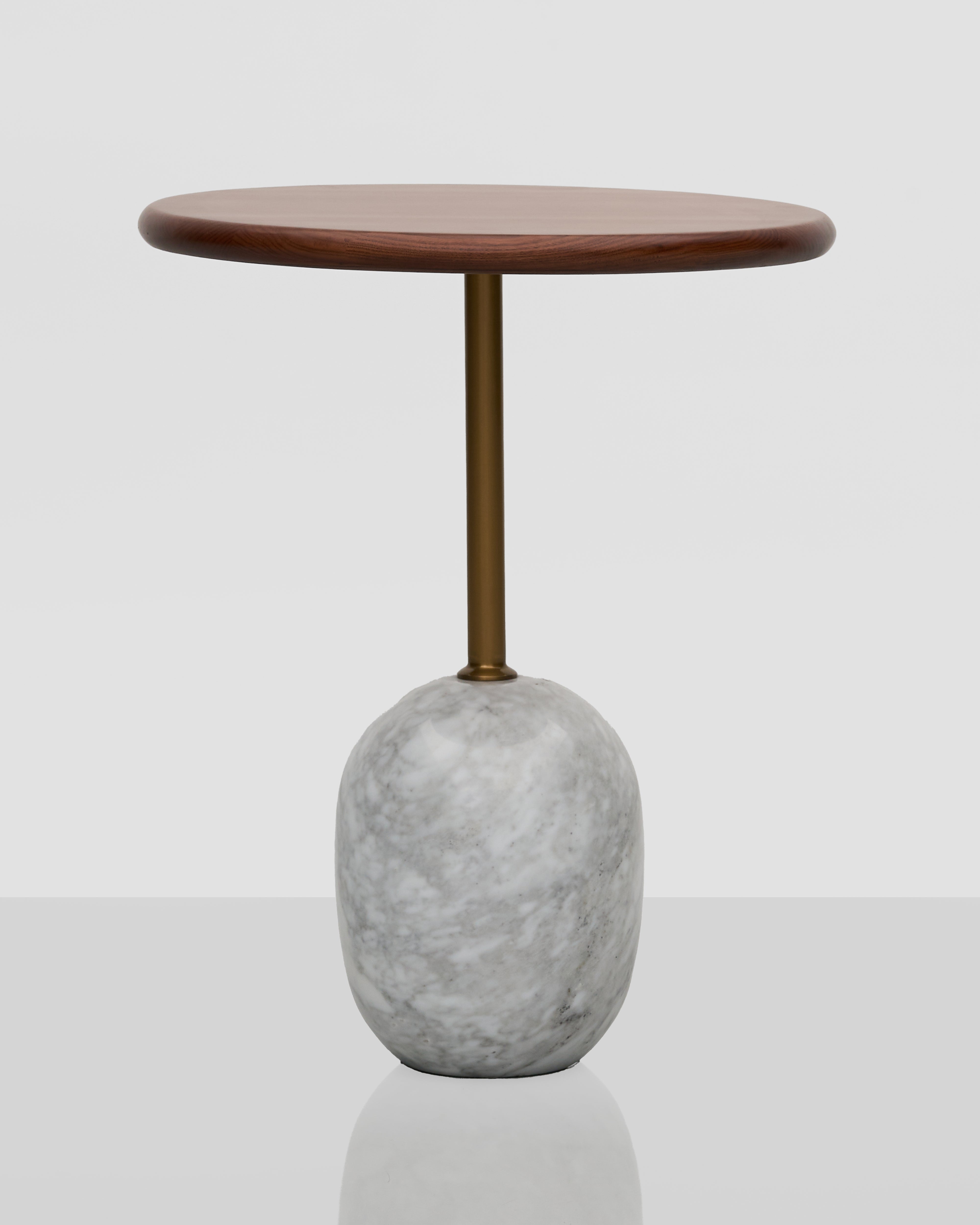 Side table with wooden top and marble base on a white background