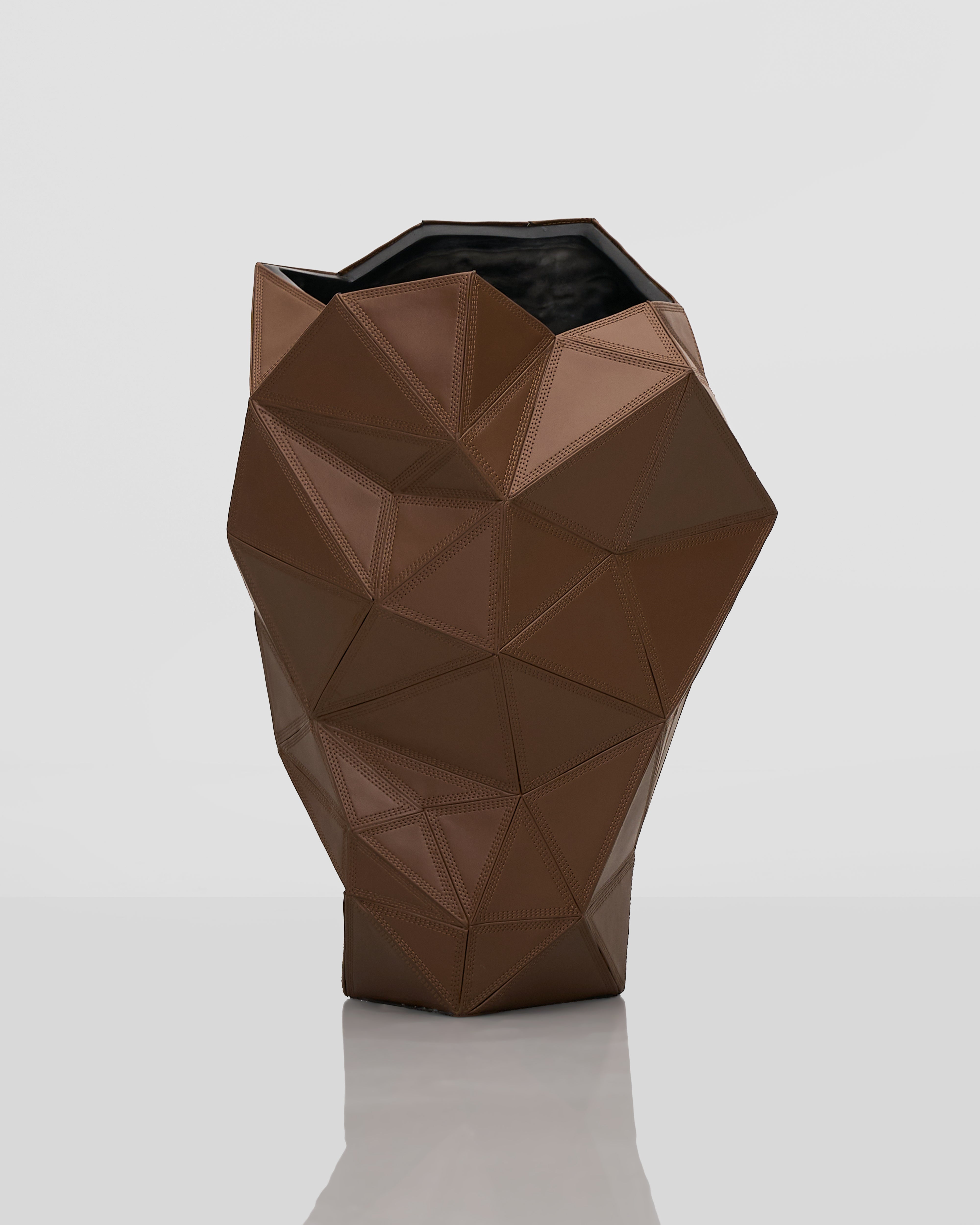Geometric brown vase on a white background