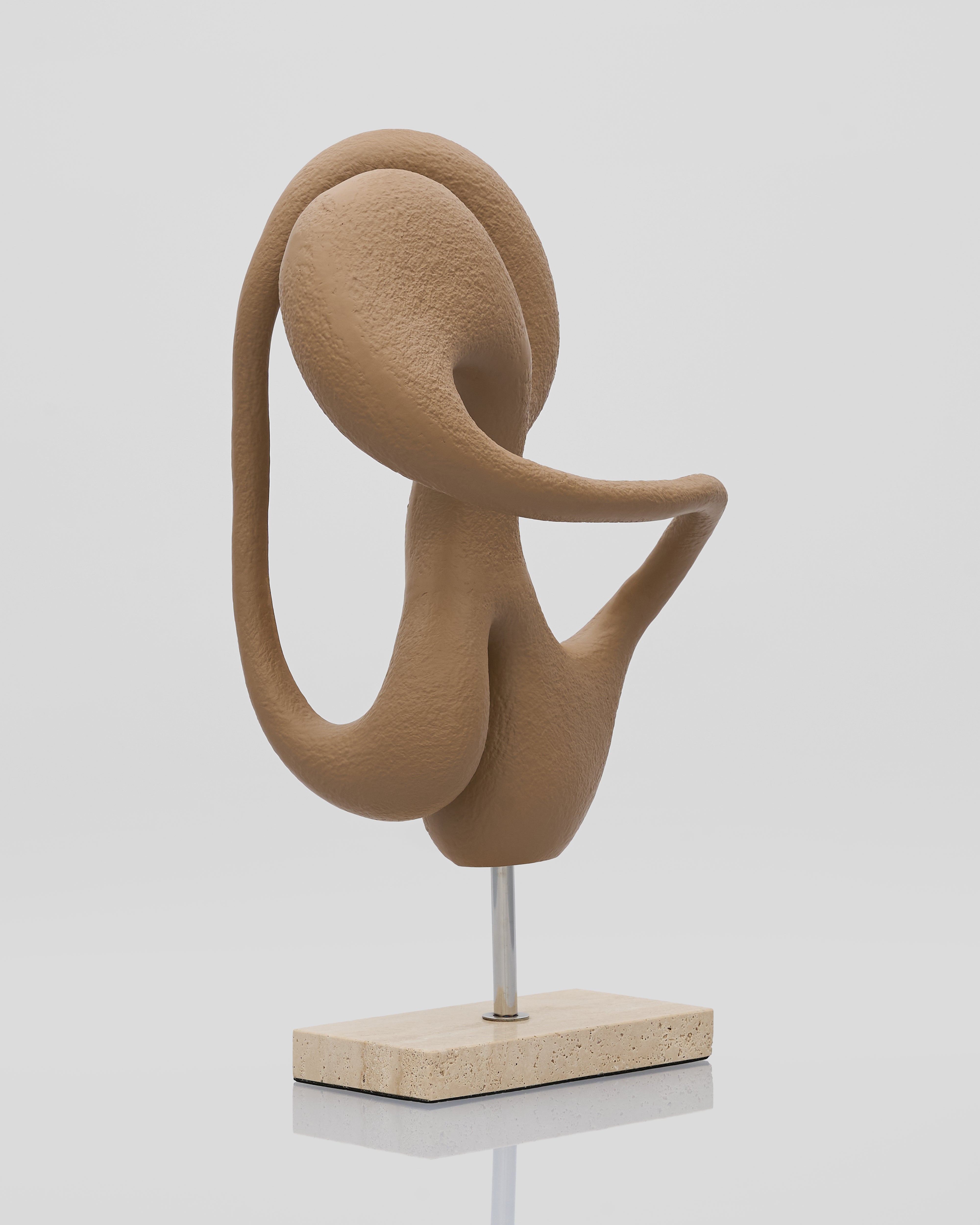 Beige abstract sculpture with curve design on a white background
