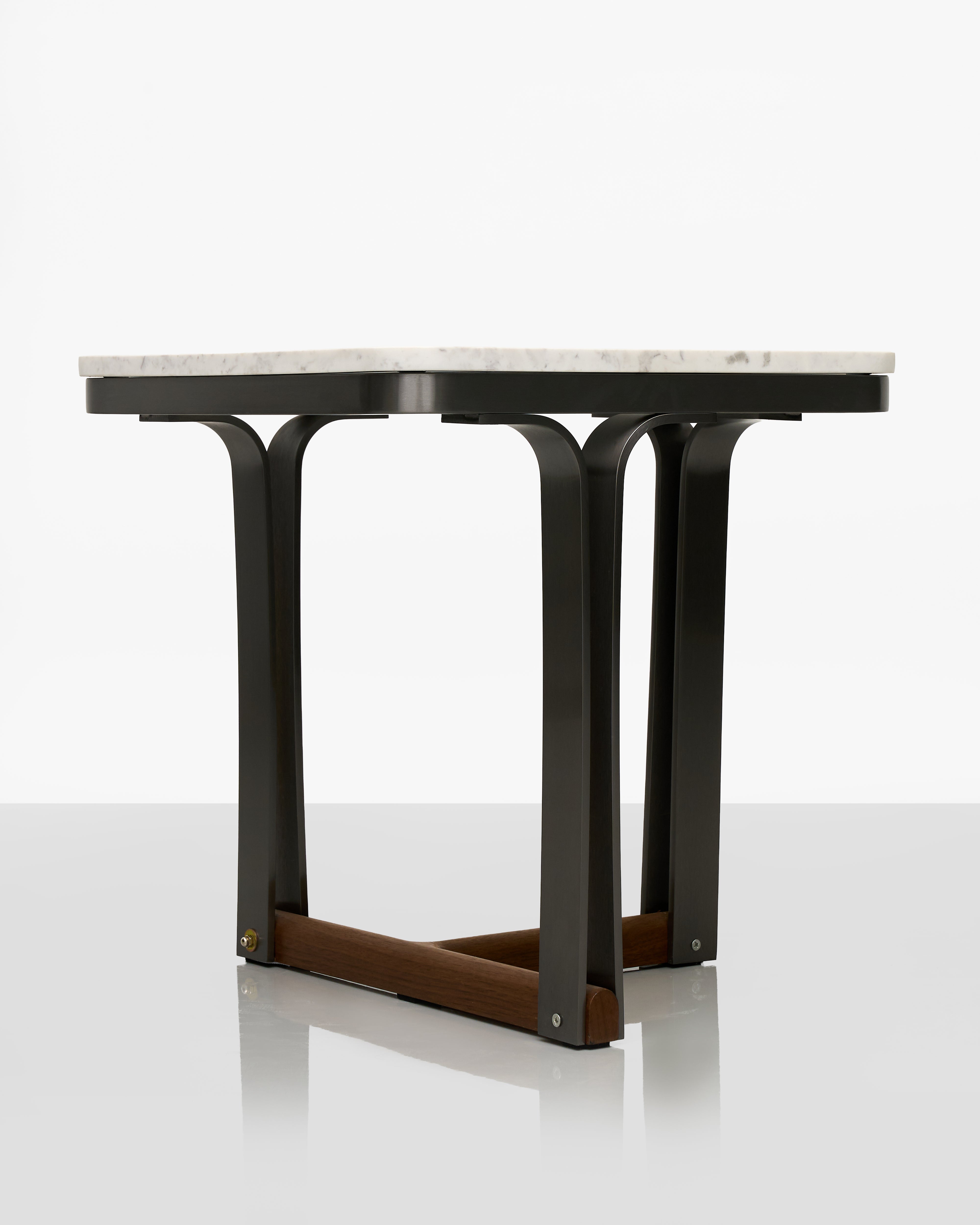 Table with marble top and black metal legs on a white background