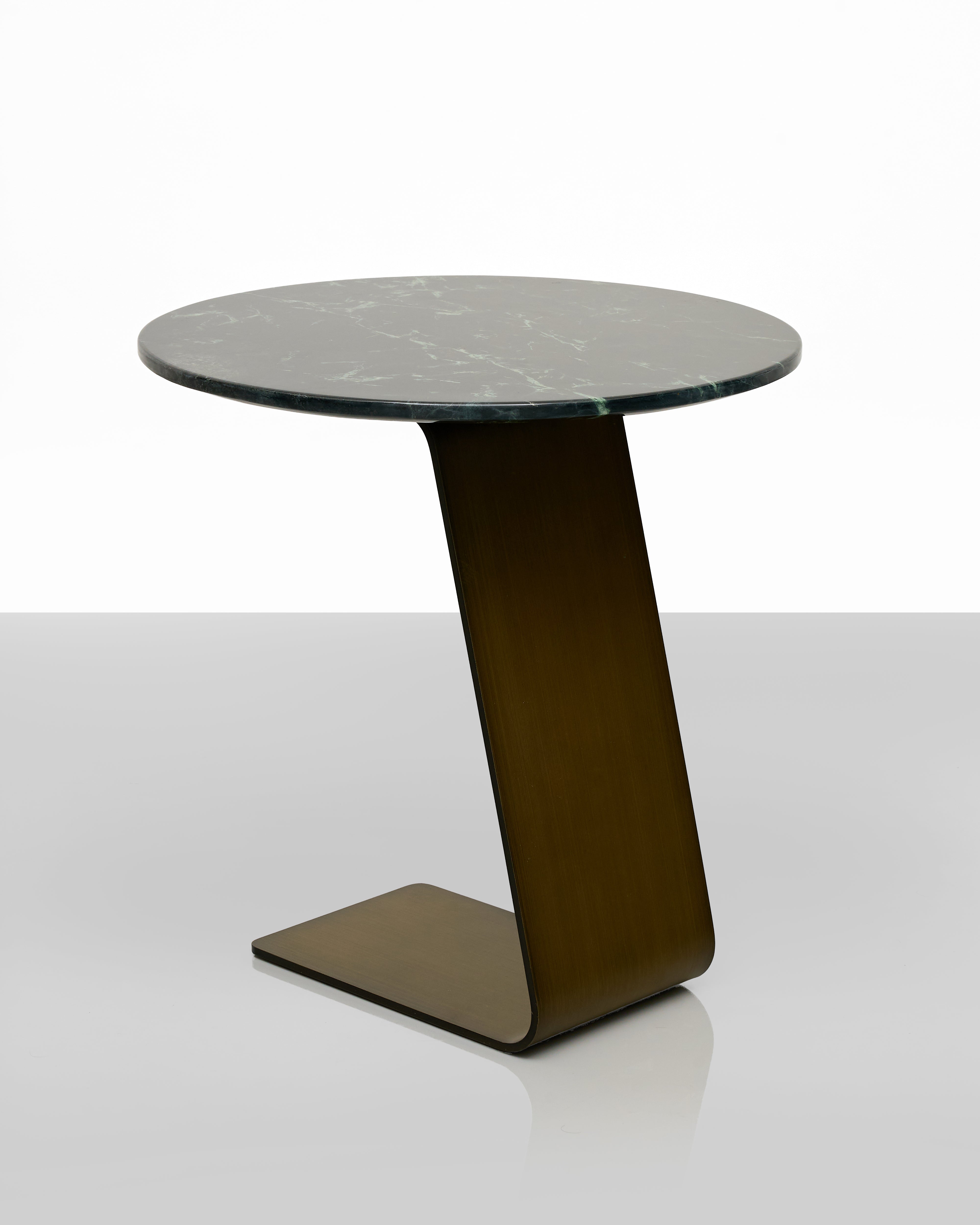 Modern side table with marble top and brown base on a white background