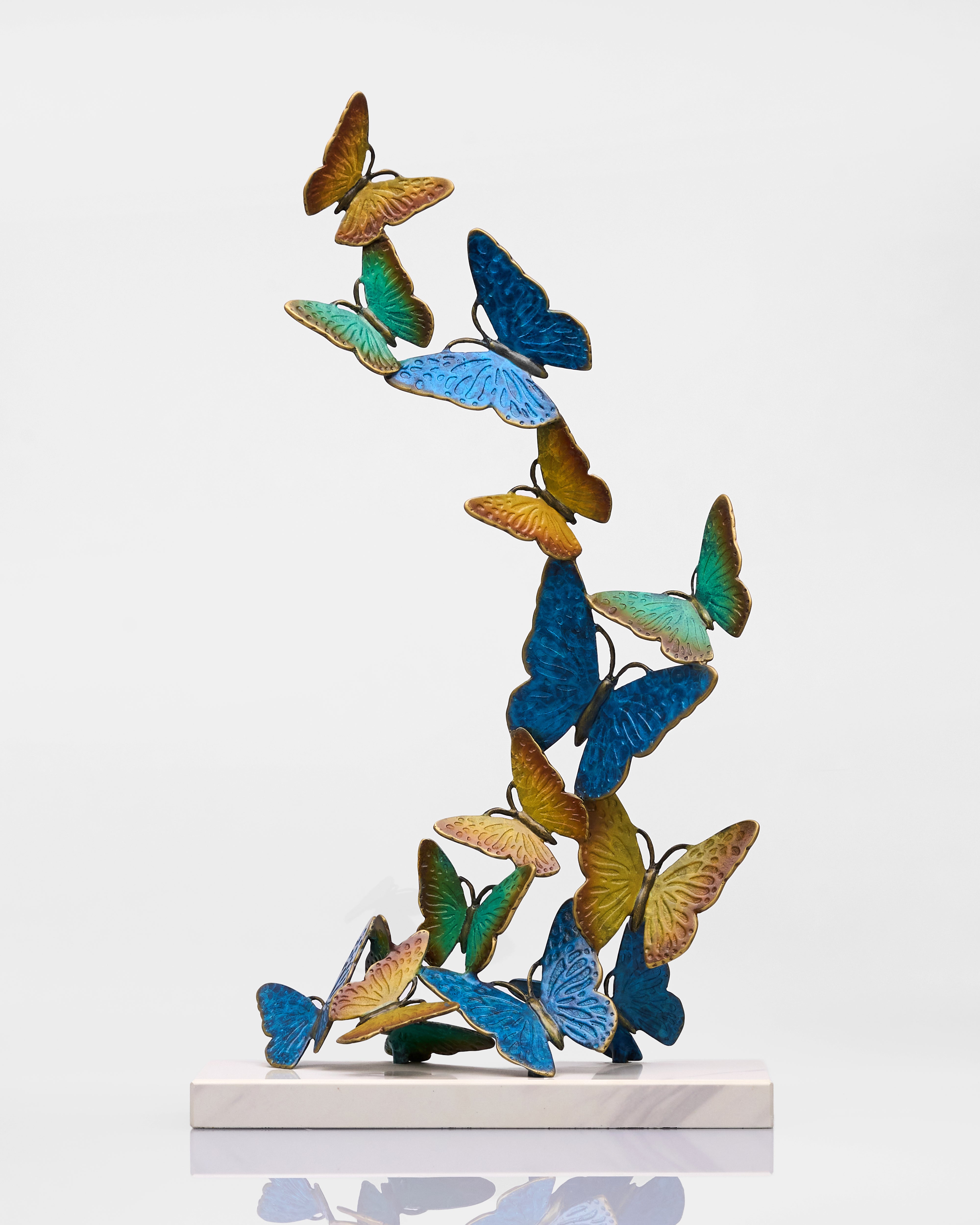 Colorful butterfly sculpture on a white background