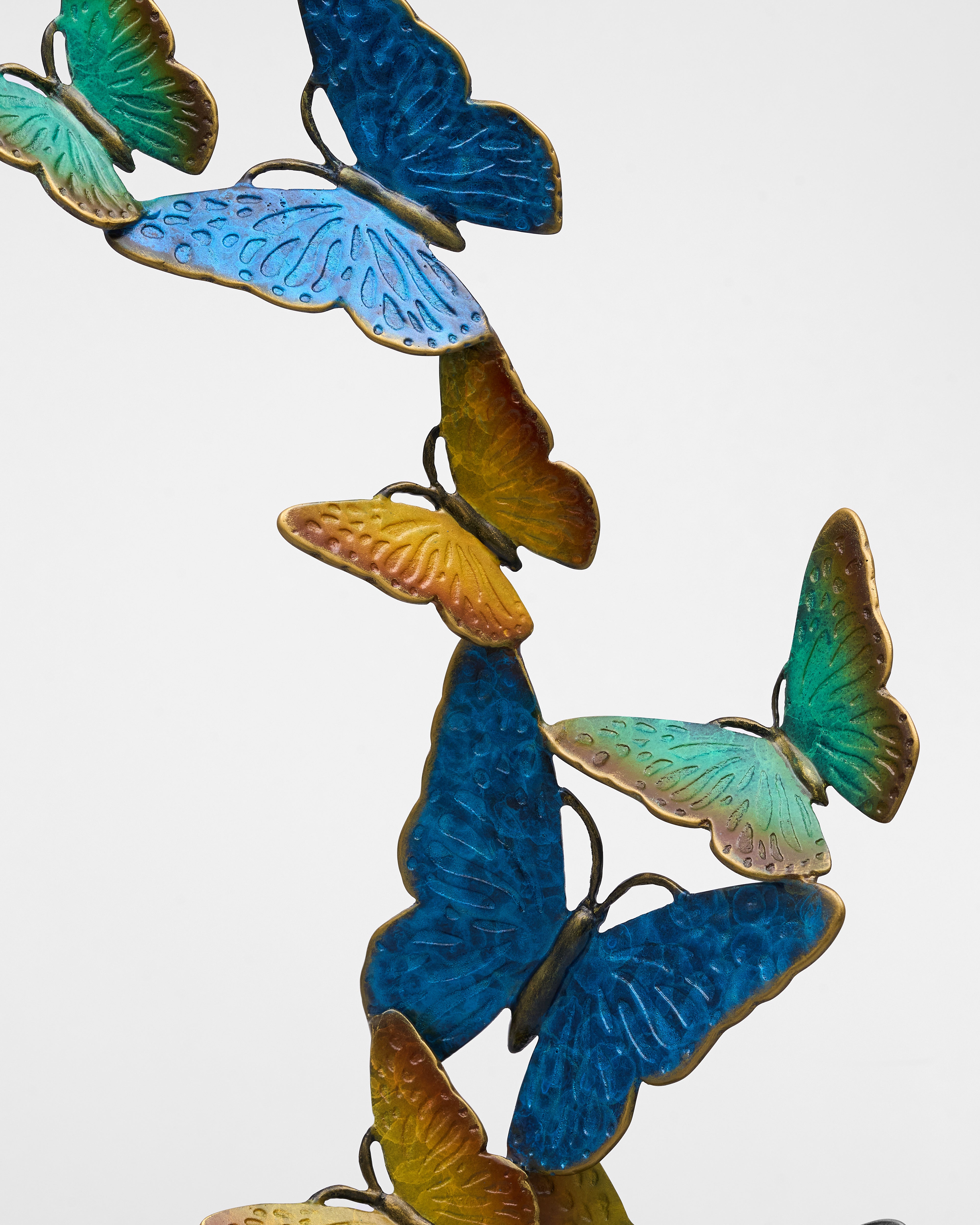 Decorative Butterfly Dazzle Decor with blue and green butterflies on a white background