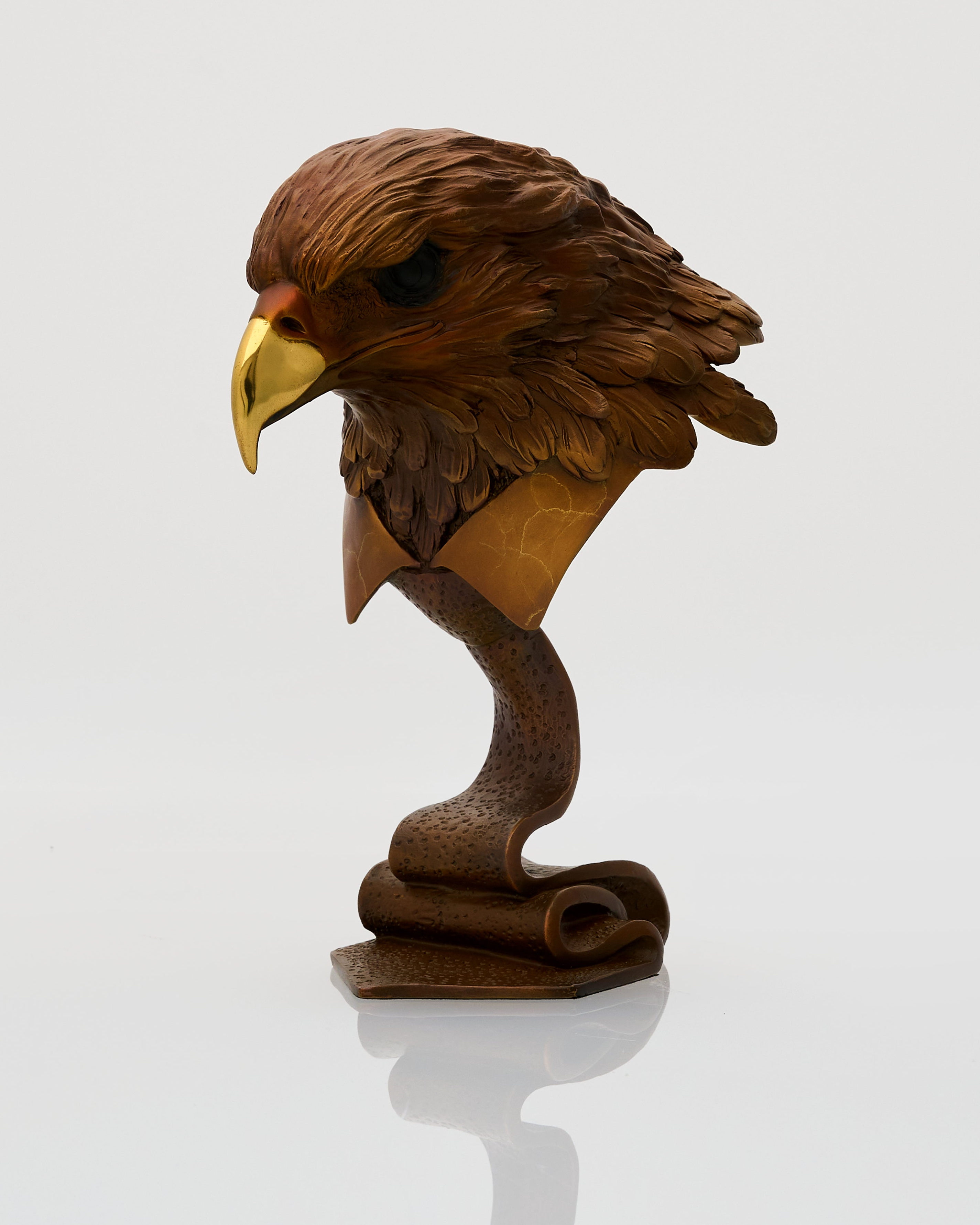 eagle sculpture of an eagle head on a white background