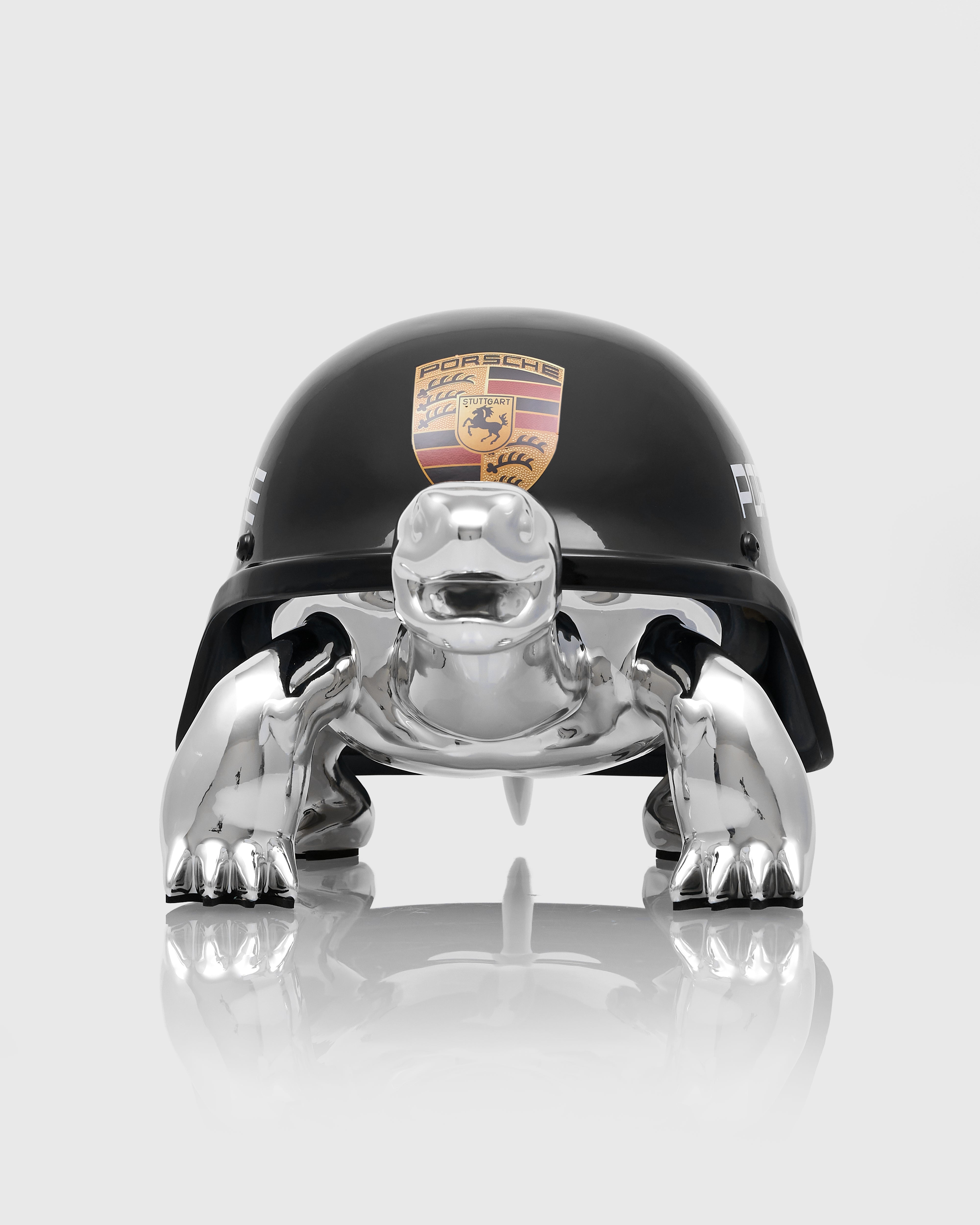 Elite Sigil Turtle Decor with Porsche logo on a white background