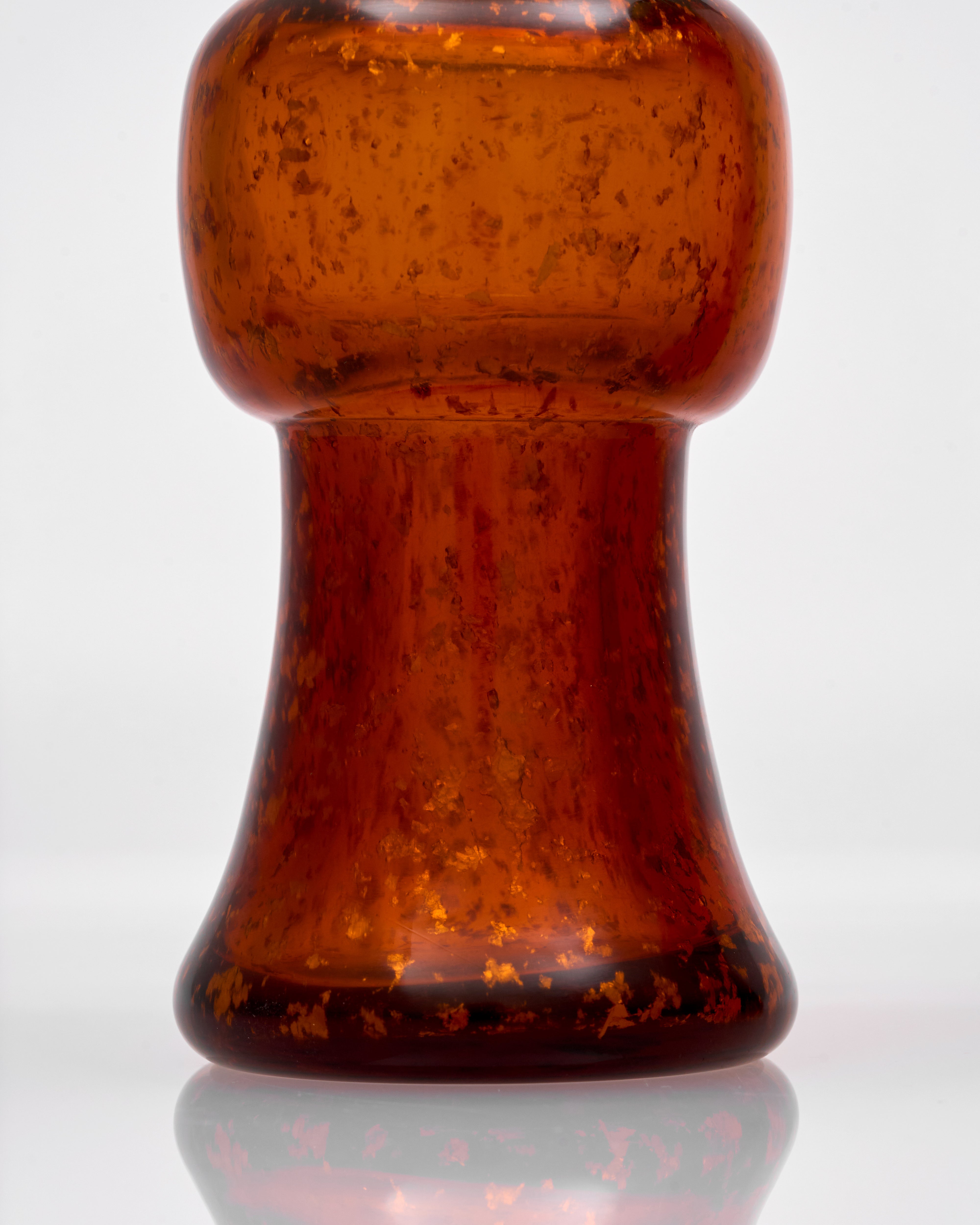 Brown glass vase materail close  on a white background