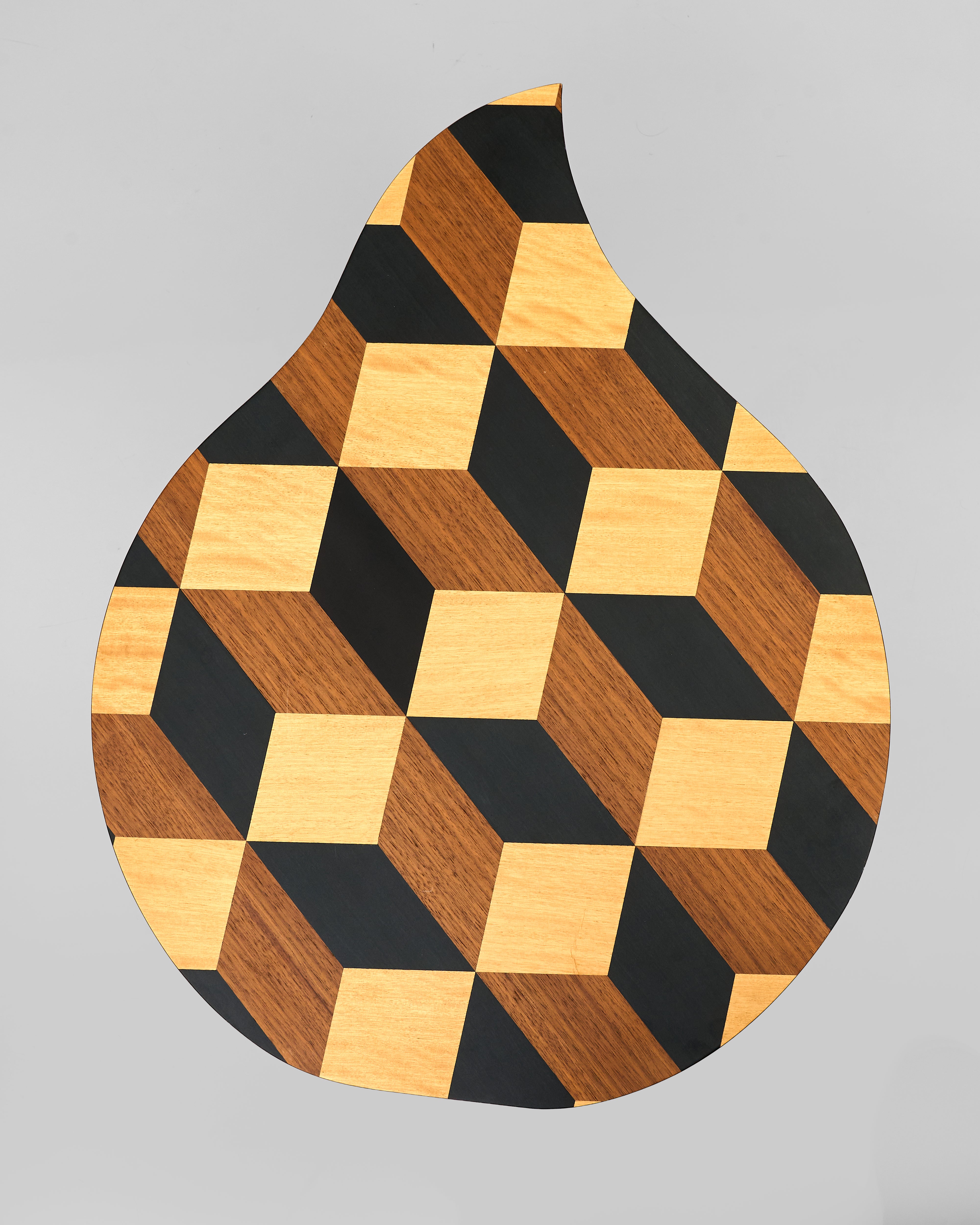 Wooden tabletop with geometric pattern on a gray background
