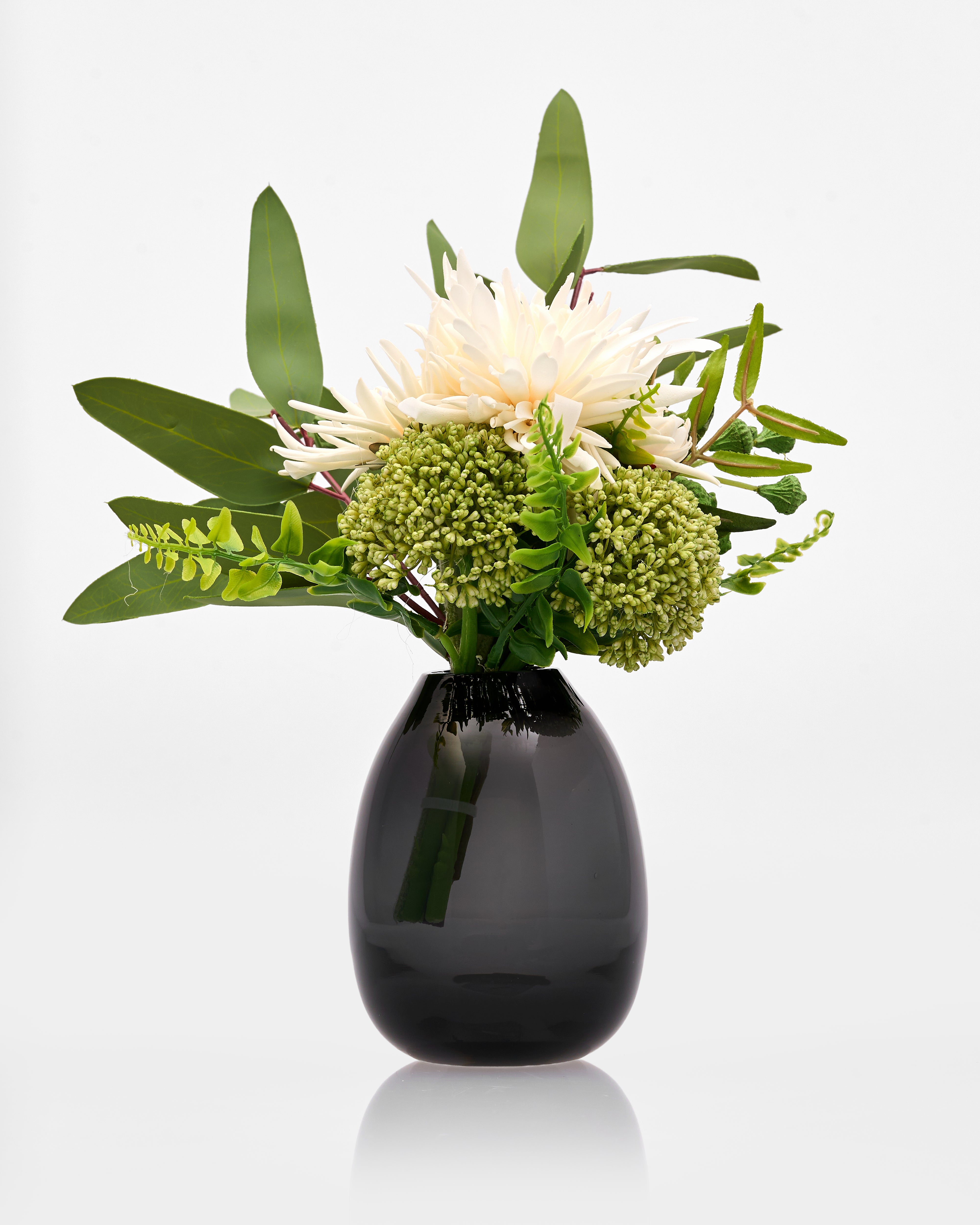 Black vase with a bouquet of flowers on a white background