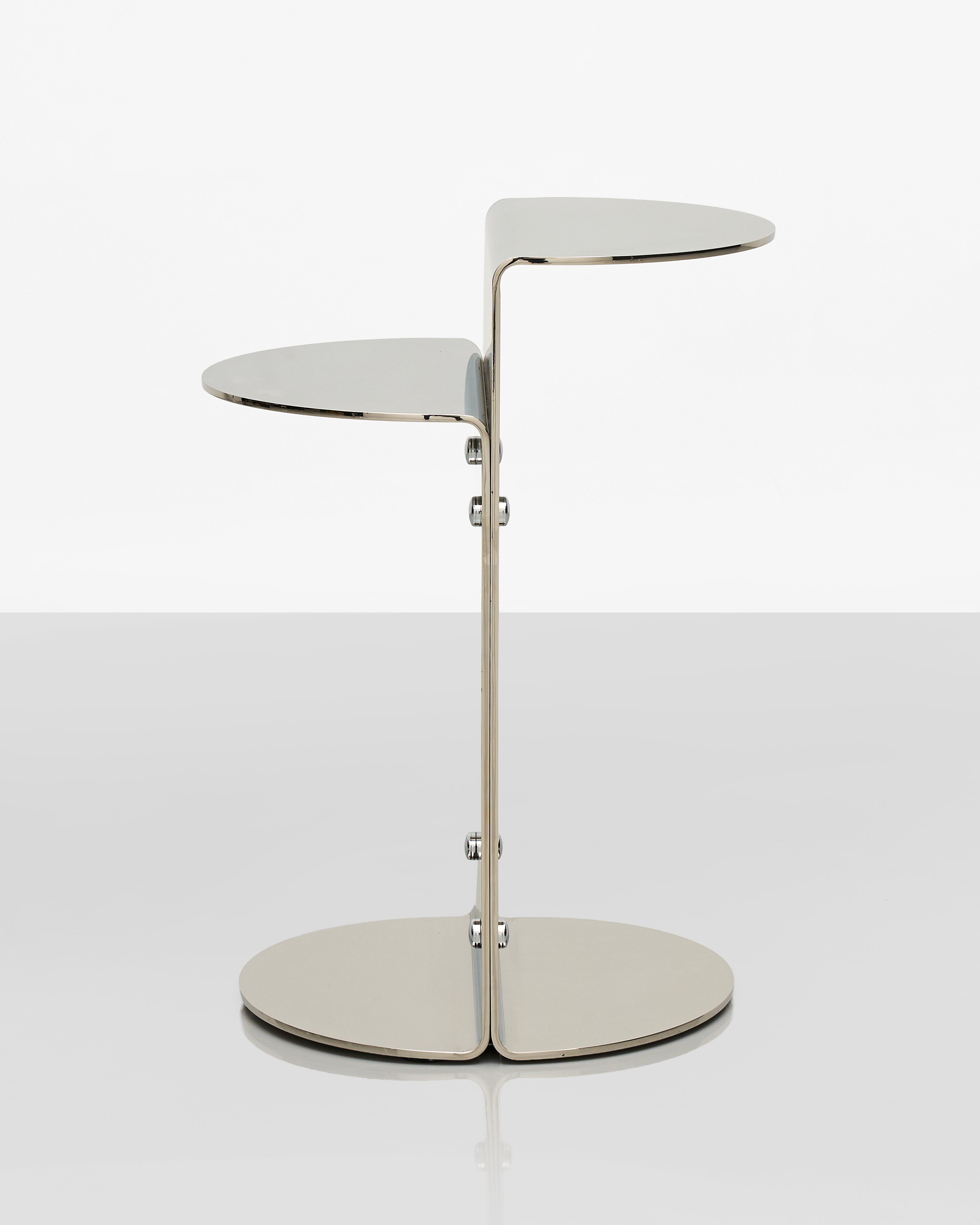 Modern side table with two round tables on a white background