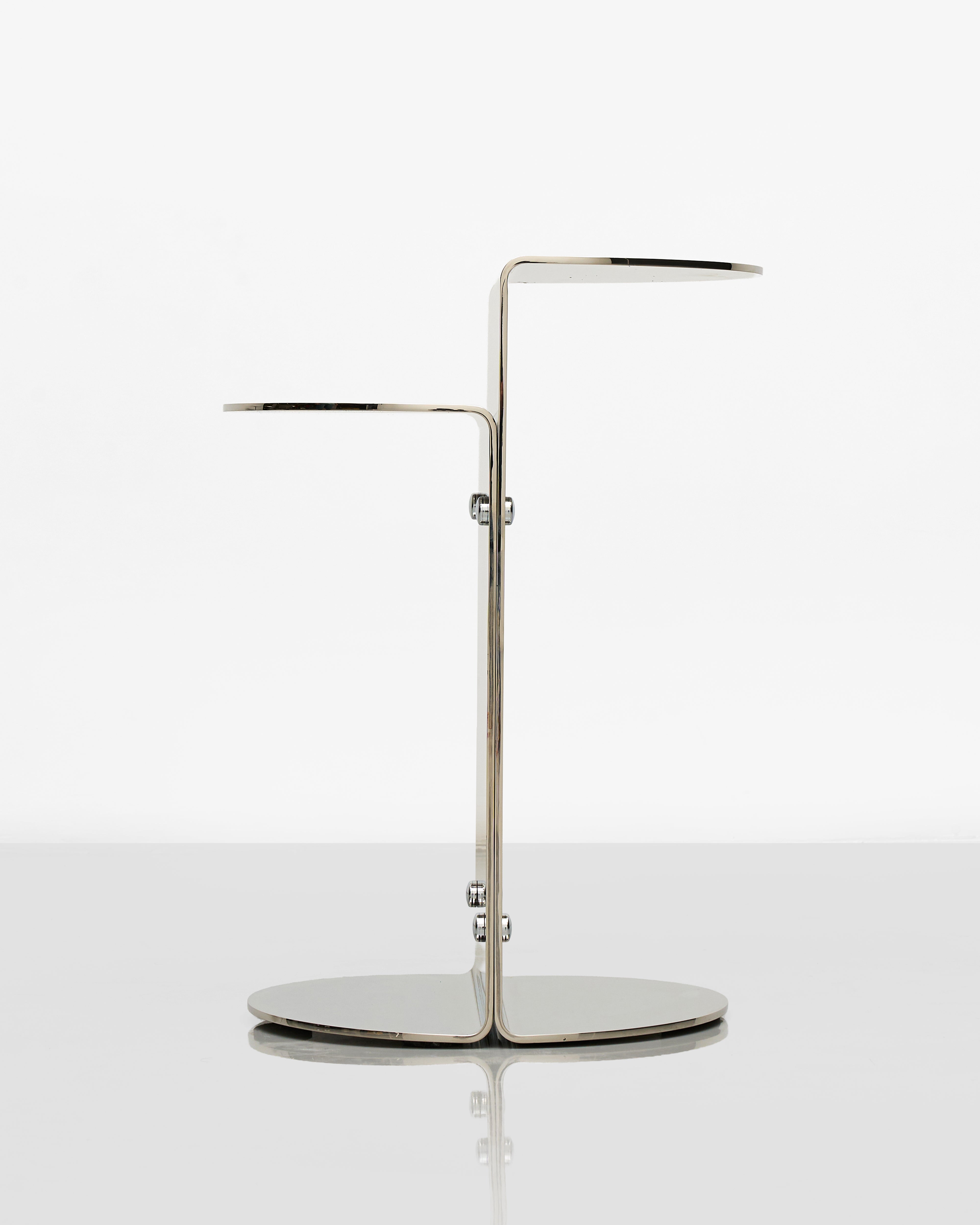 Modern silver desk lamp on a white background
