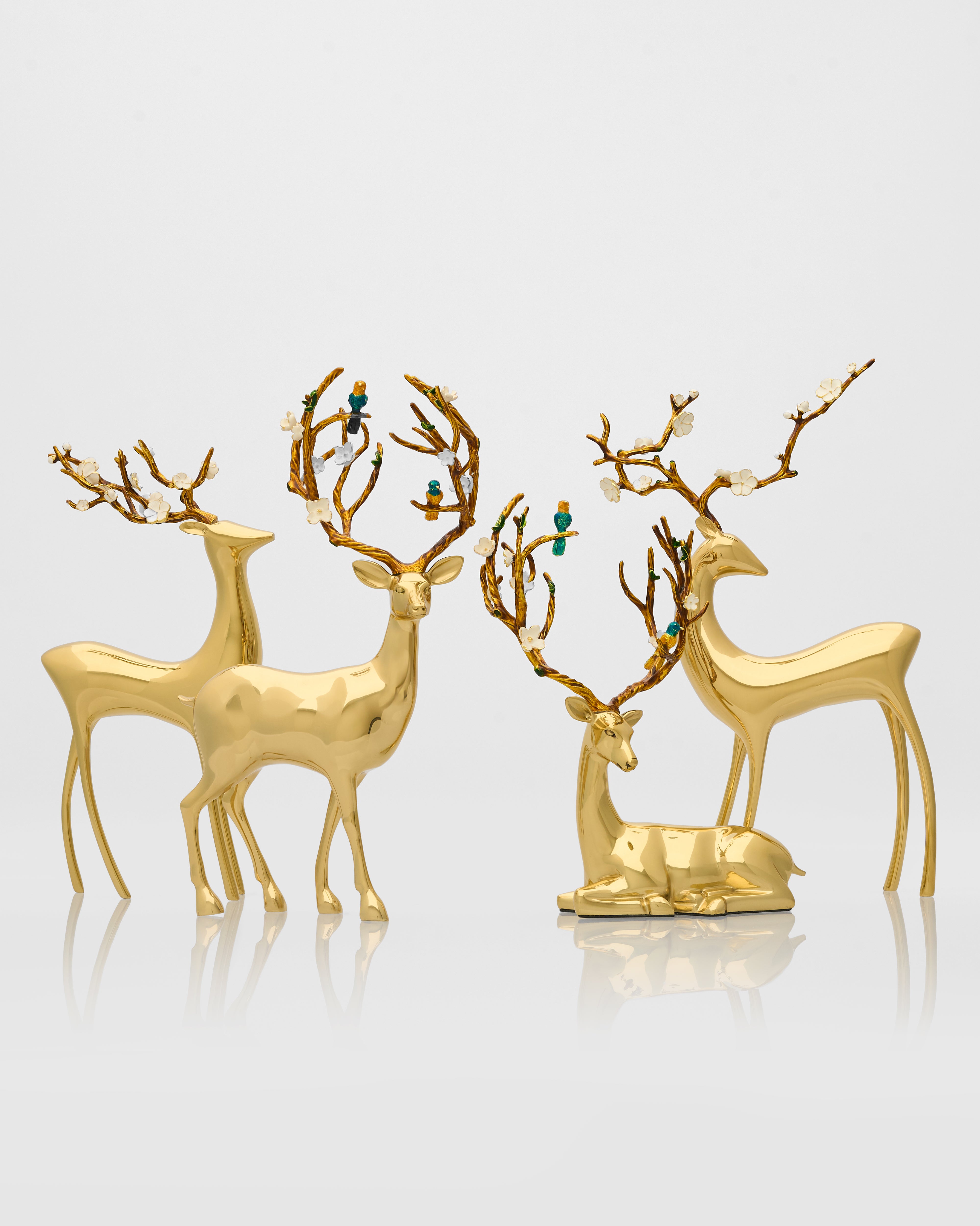 Golden deer herd figurines luxury home decor accent featuring elegant sculptural forms and refined gold finish
