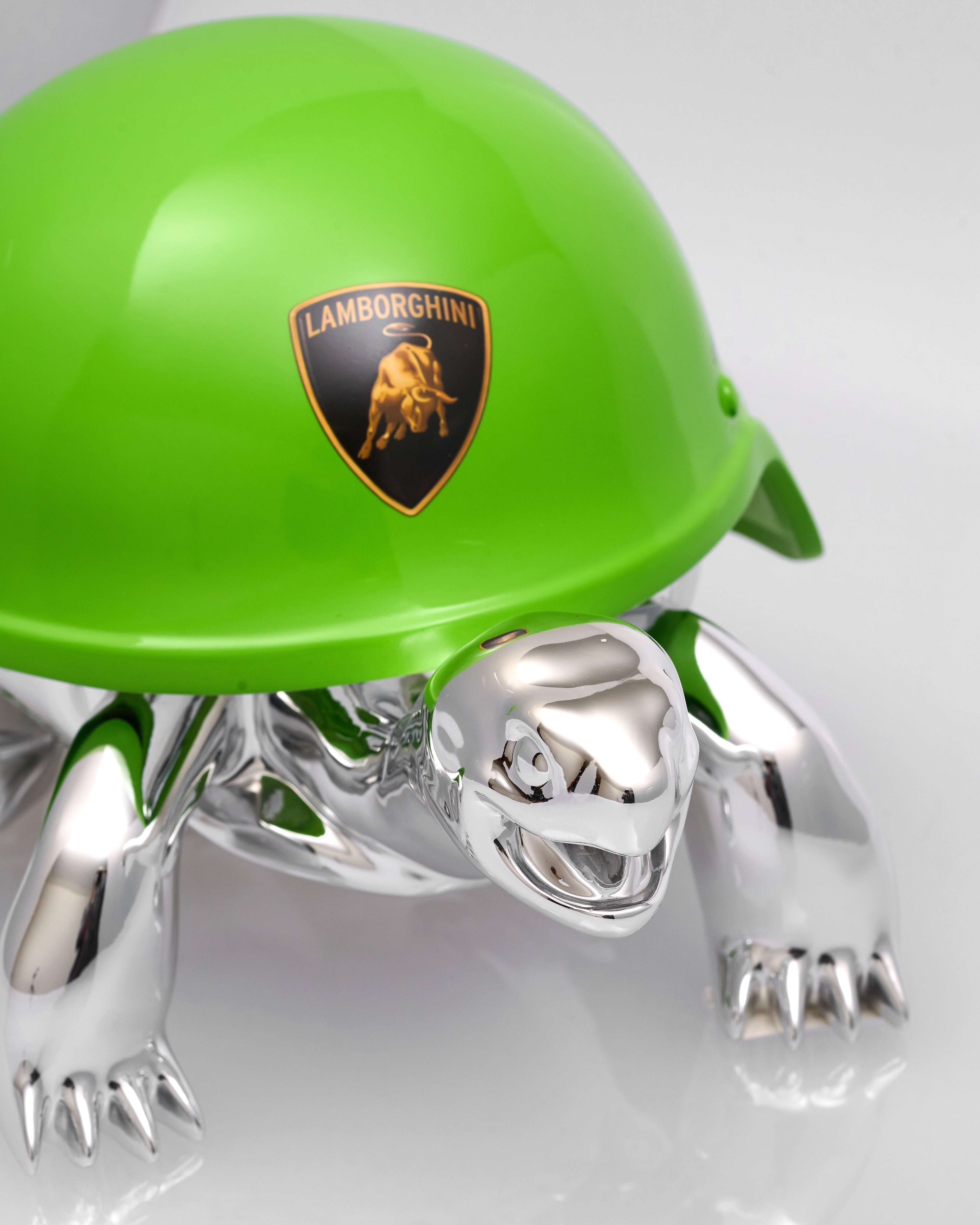 Green helmet with Lamborghini logo on a white background