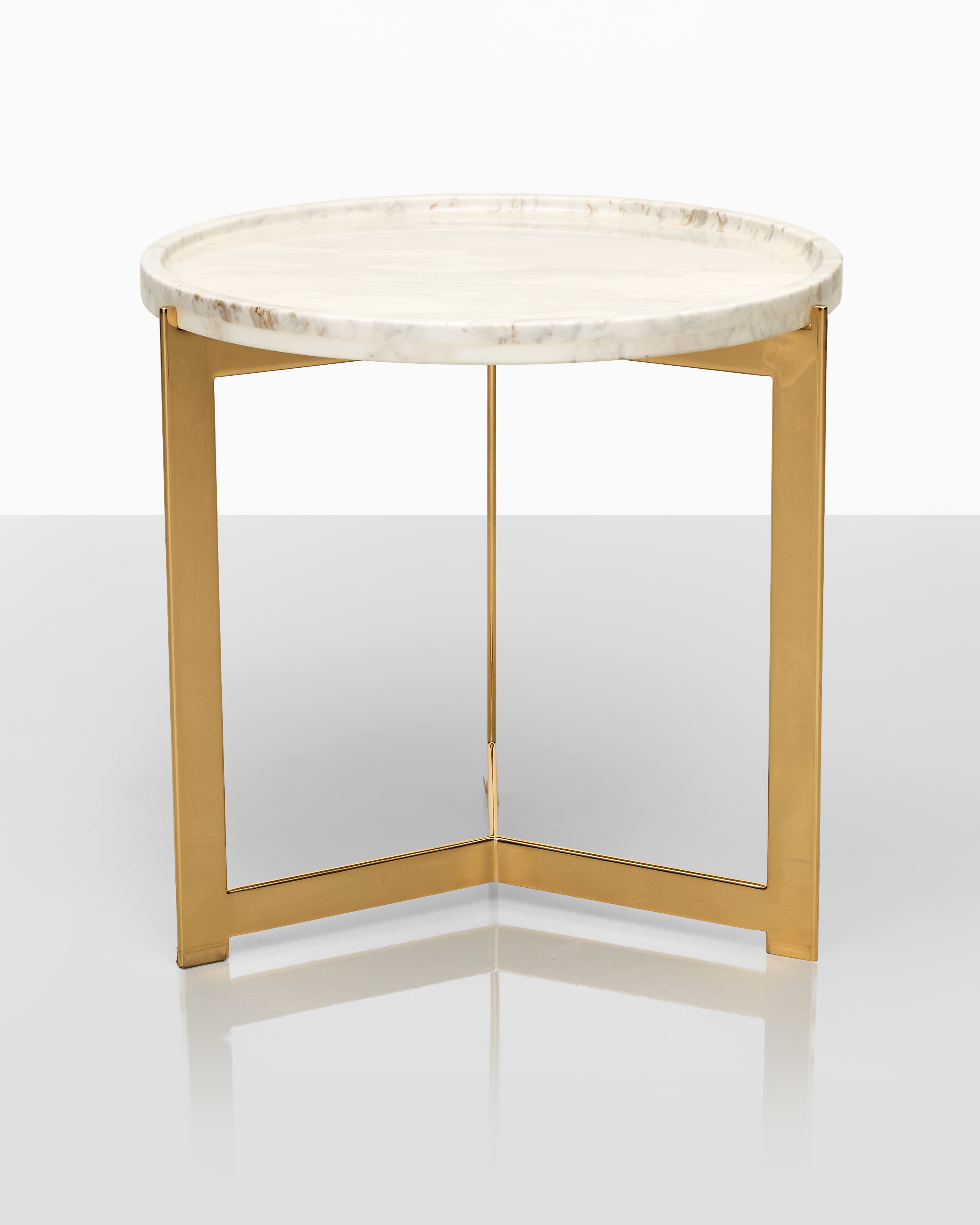 Round side table with marble top and wooden legs on a white background