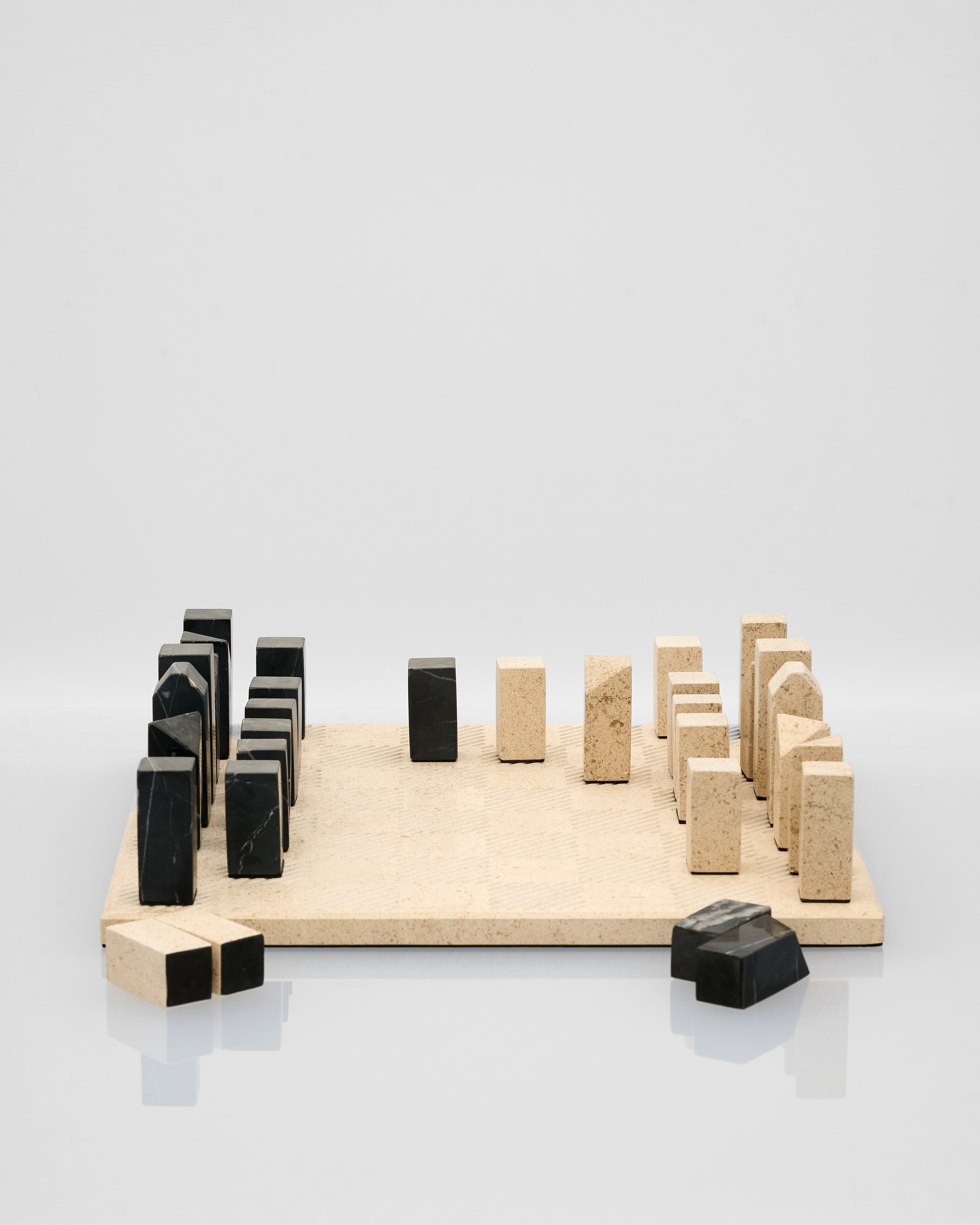marble chess board building set on a light gray background