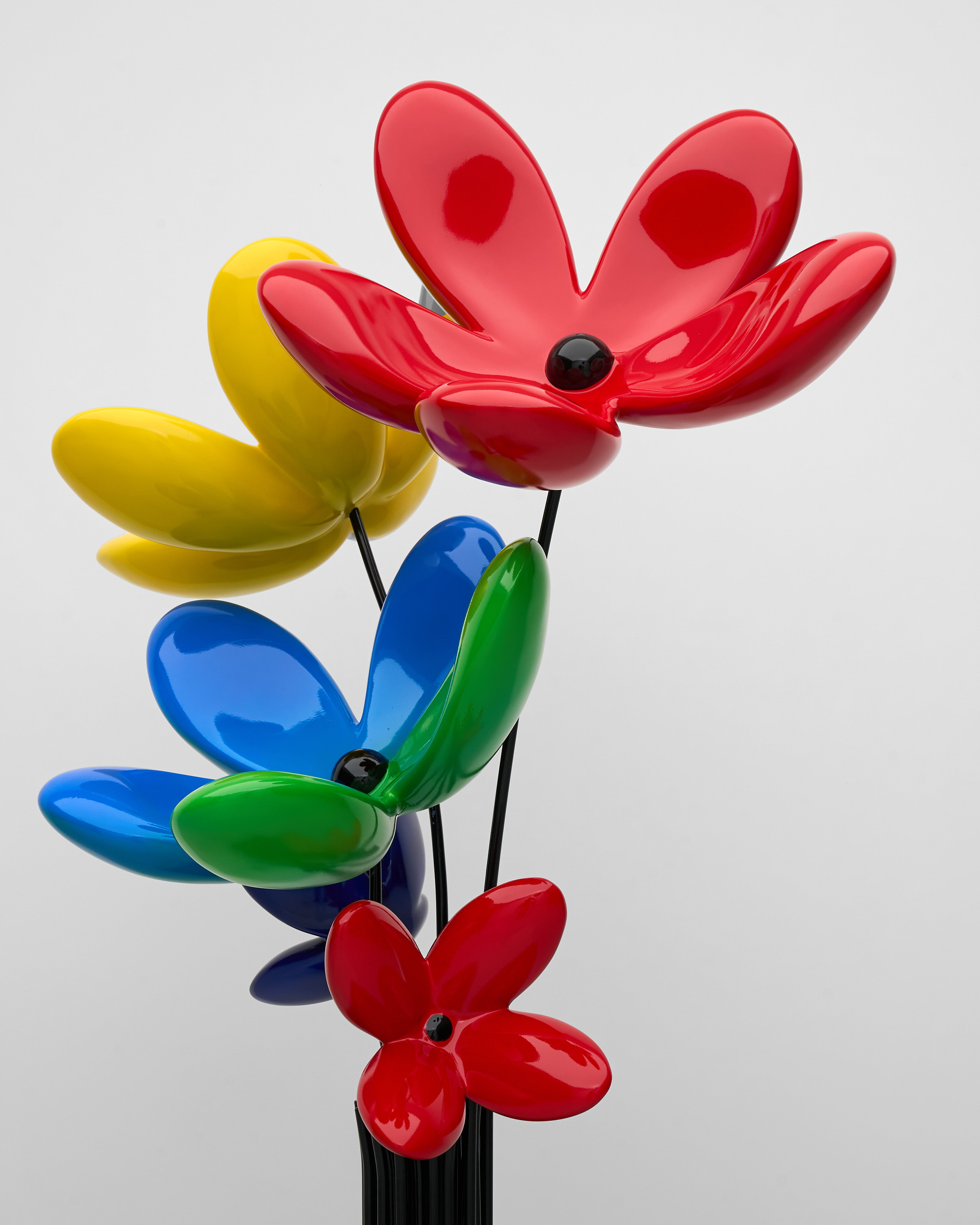 Colorful flower-shaped objects on a white background