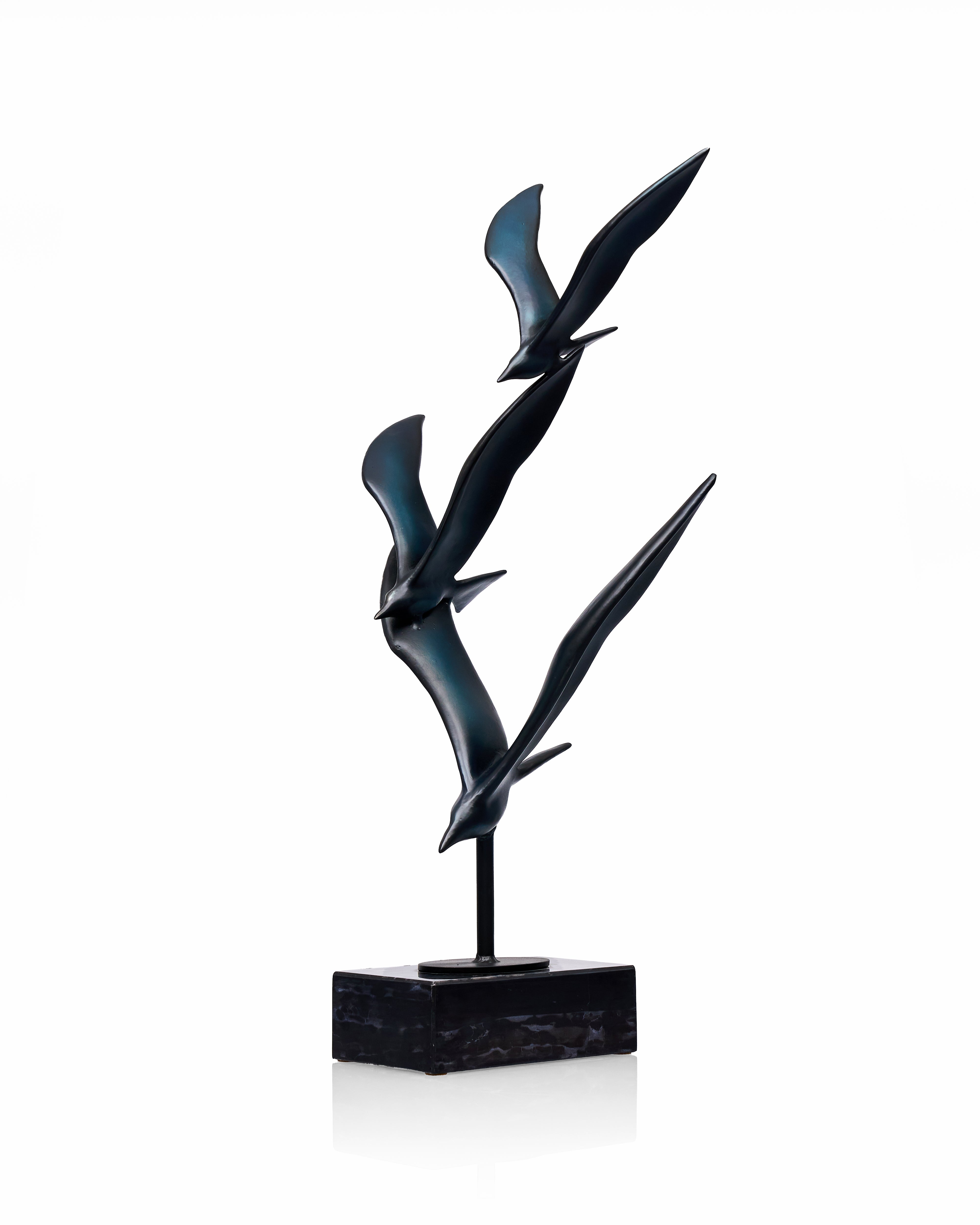 Black abstract bird sculpture on a white background