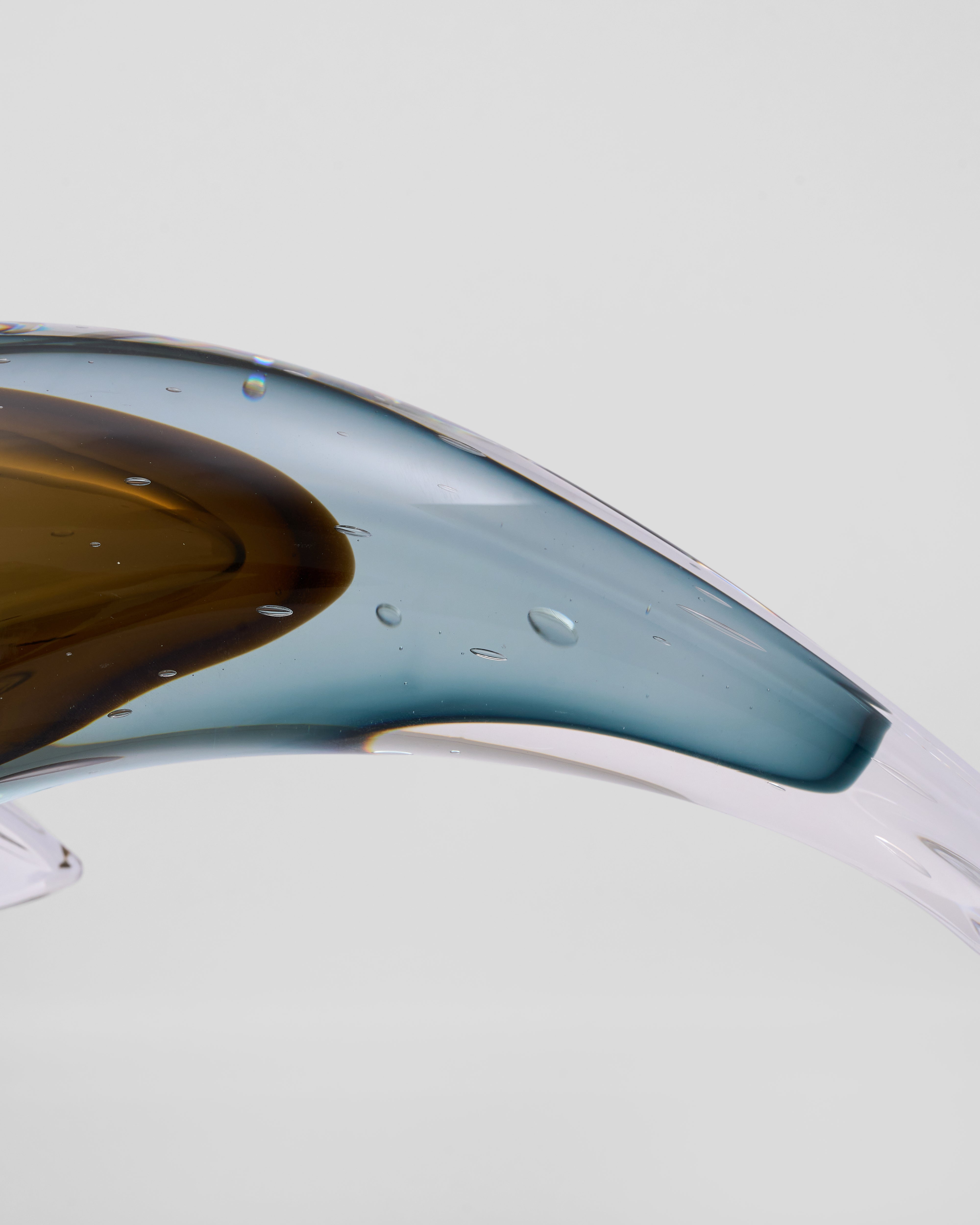 Close-up of a Orphia Crystal Glass Brown Fish Decor on a white background
