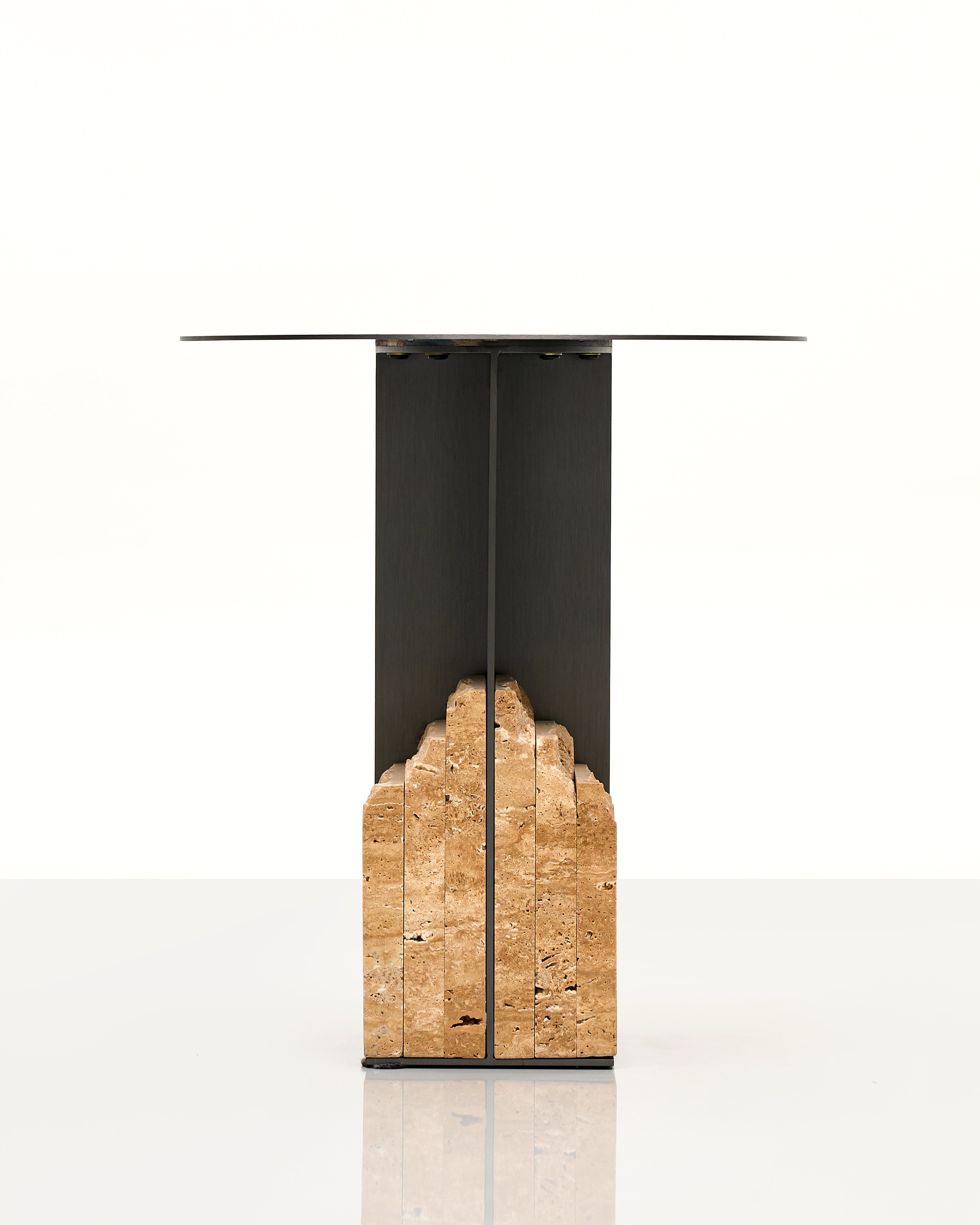 Modern table with a glass top and marble stone base on a white background