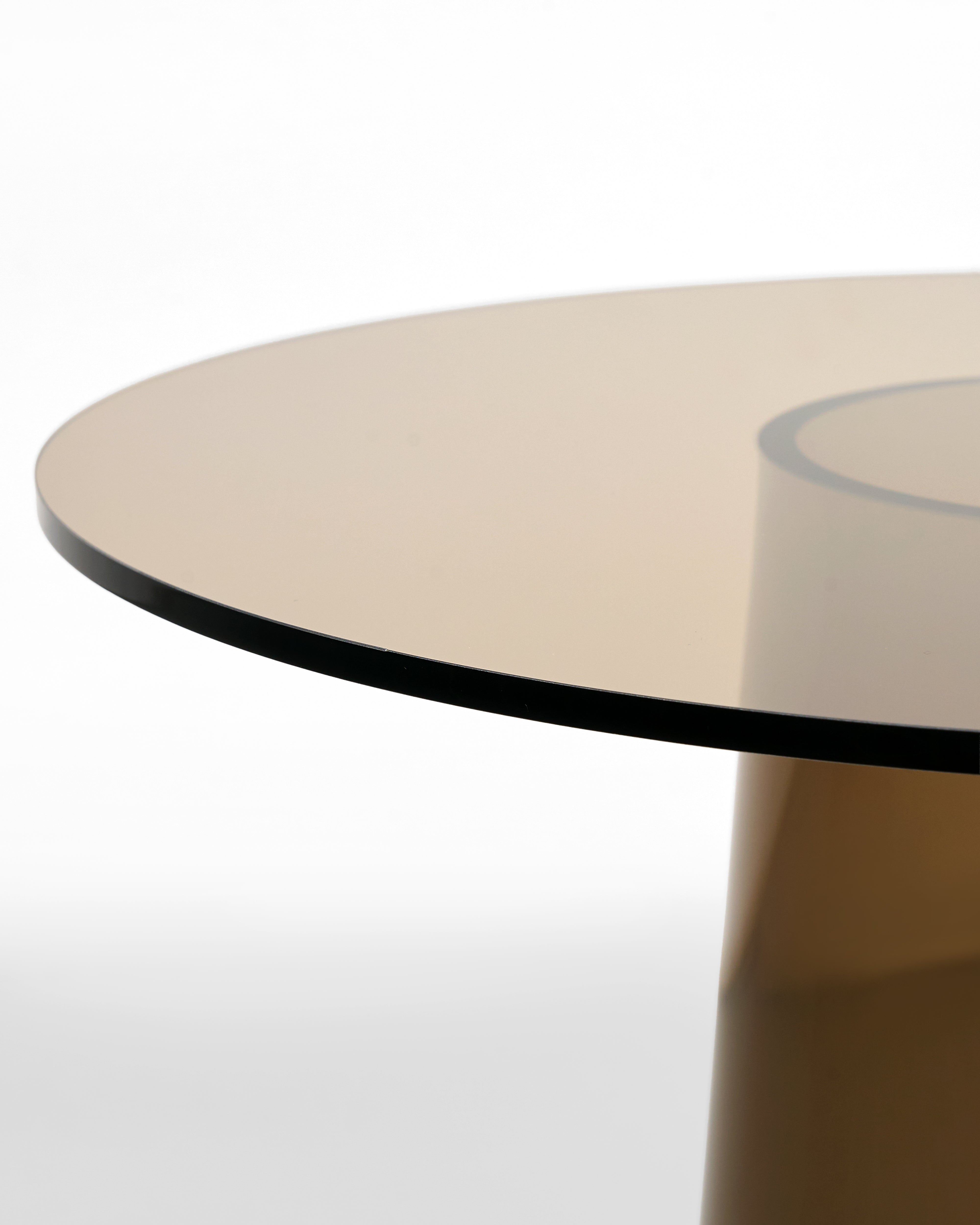 Round beige table acrylic closeup on a white background