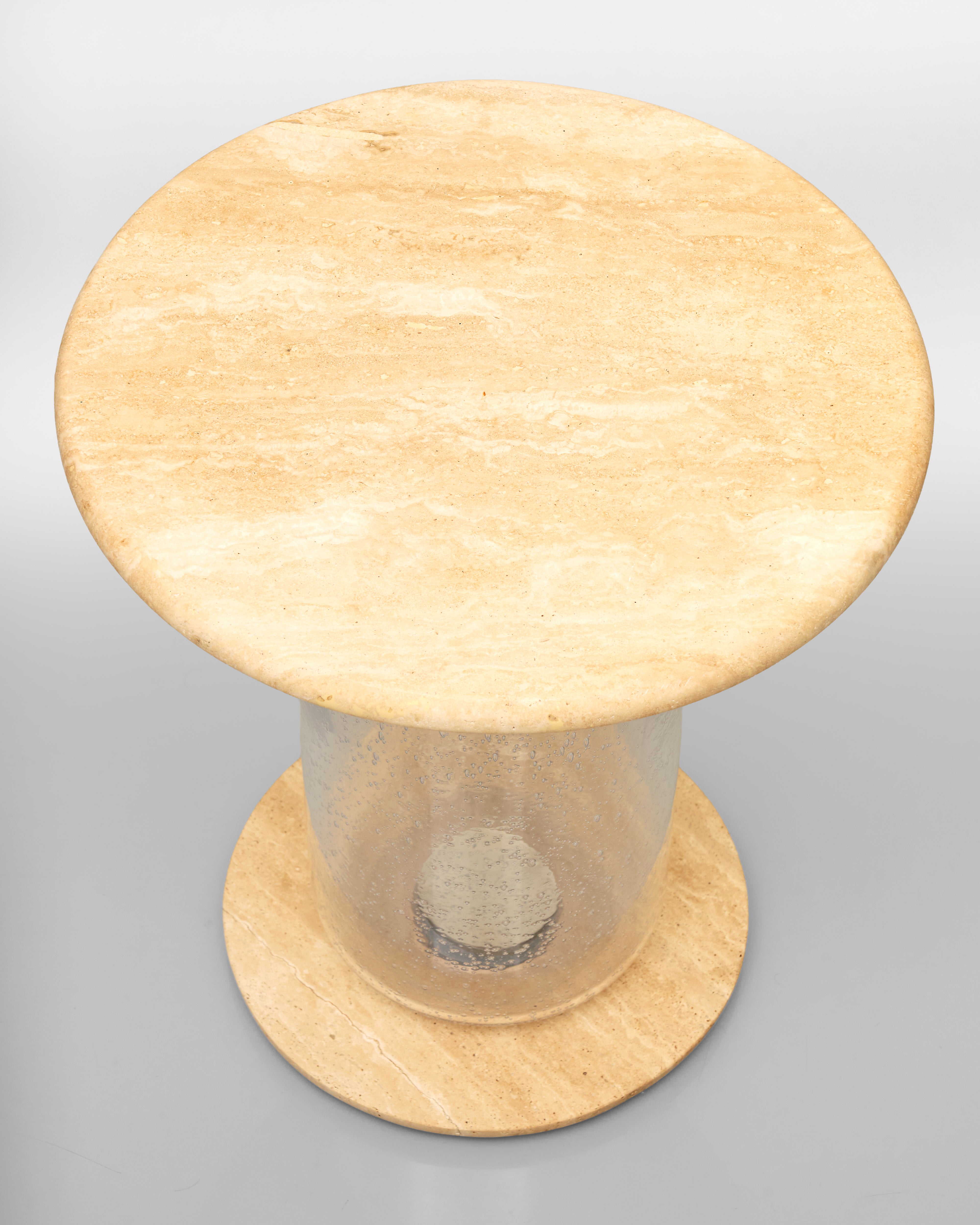 Marble side table with a cylindrical container on a gray background