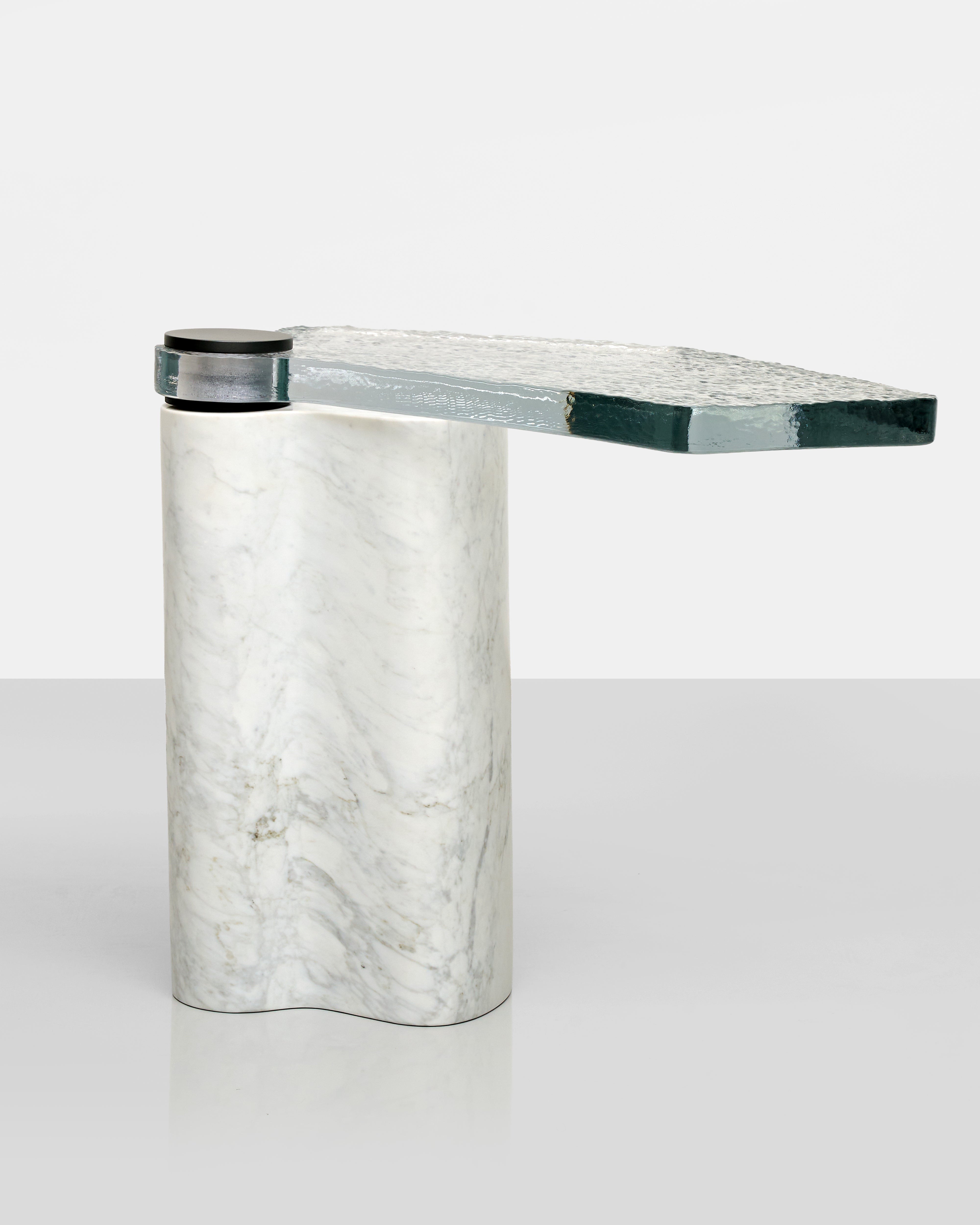 Marble side table with a white and gray pattern on a white background