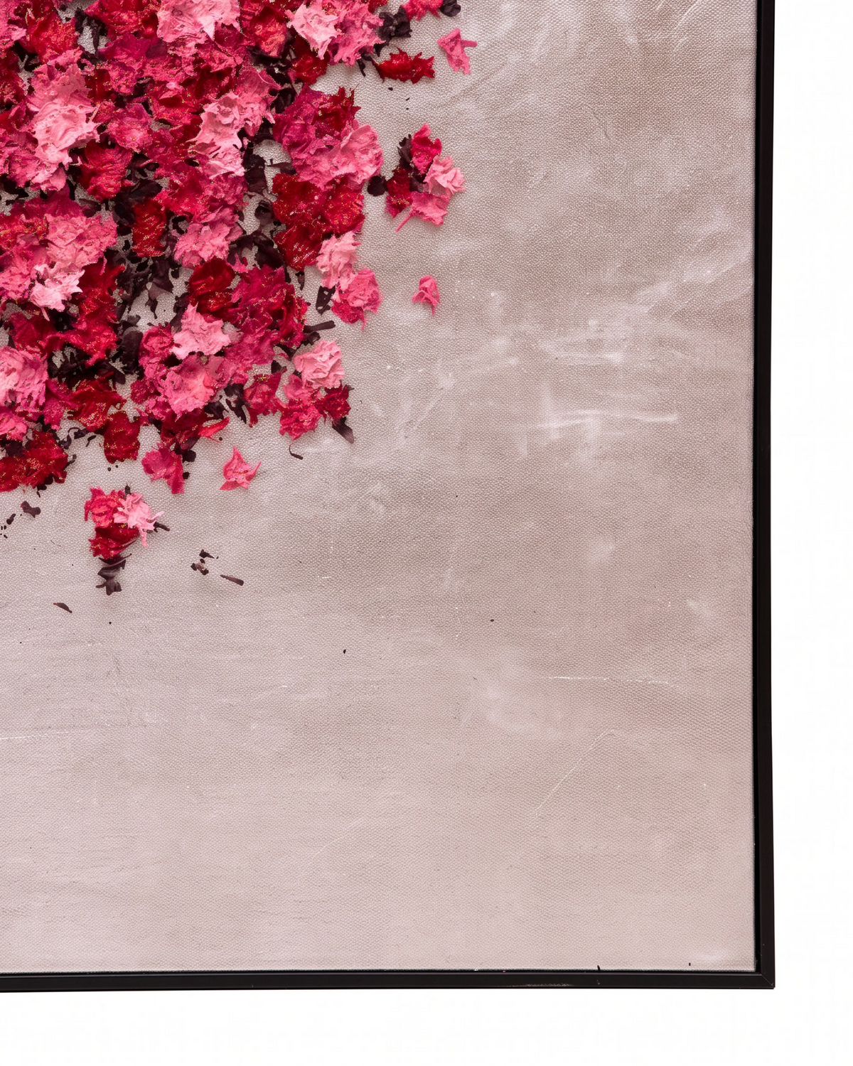 Framed wall art featuring a textured light beige background with a dense cluster of layered red and pink maple leaves concentrated in the upper left, set against a plain white background.