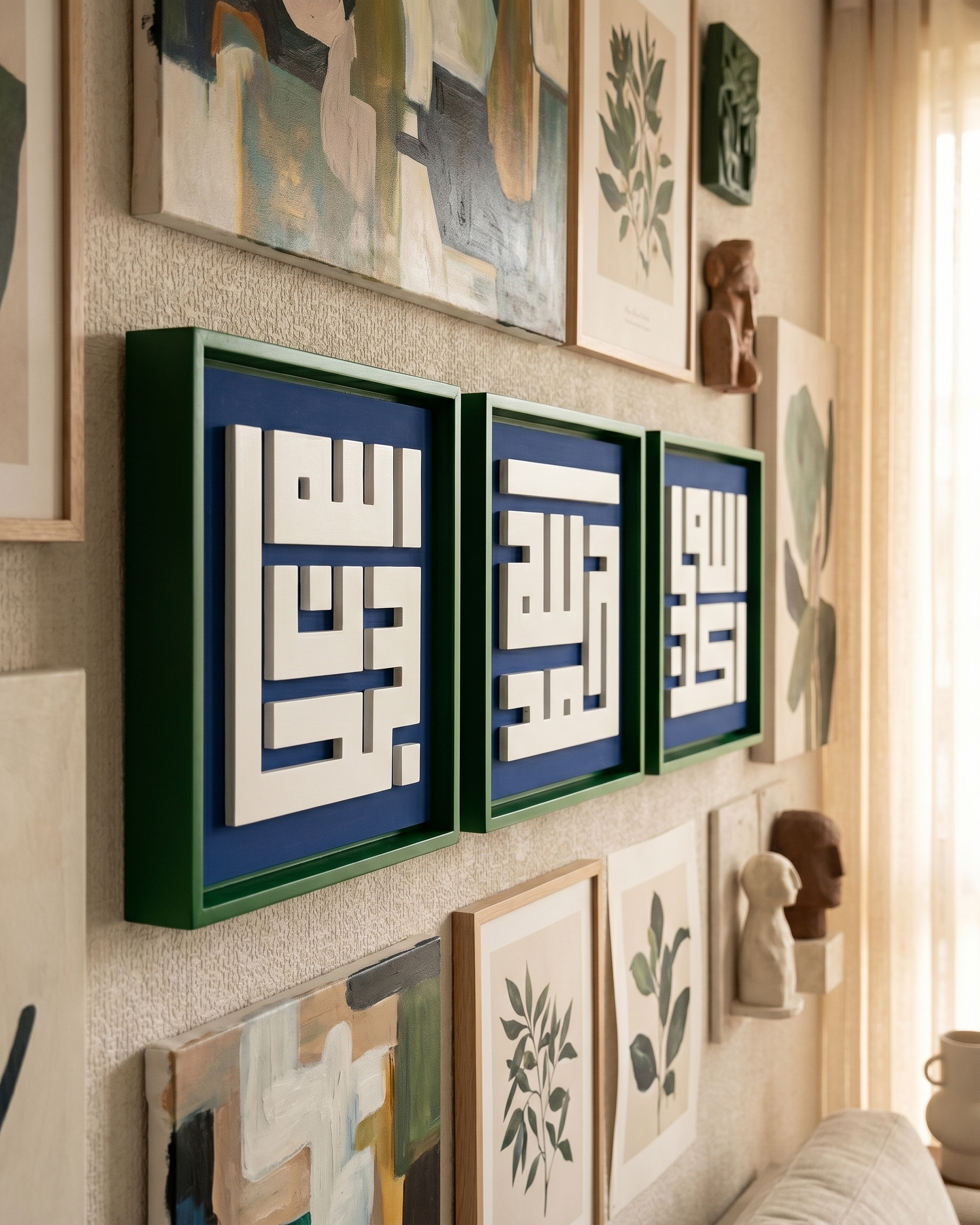 Wall with various framed artworks including abstract and botanical designs.