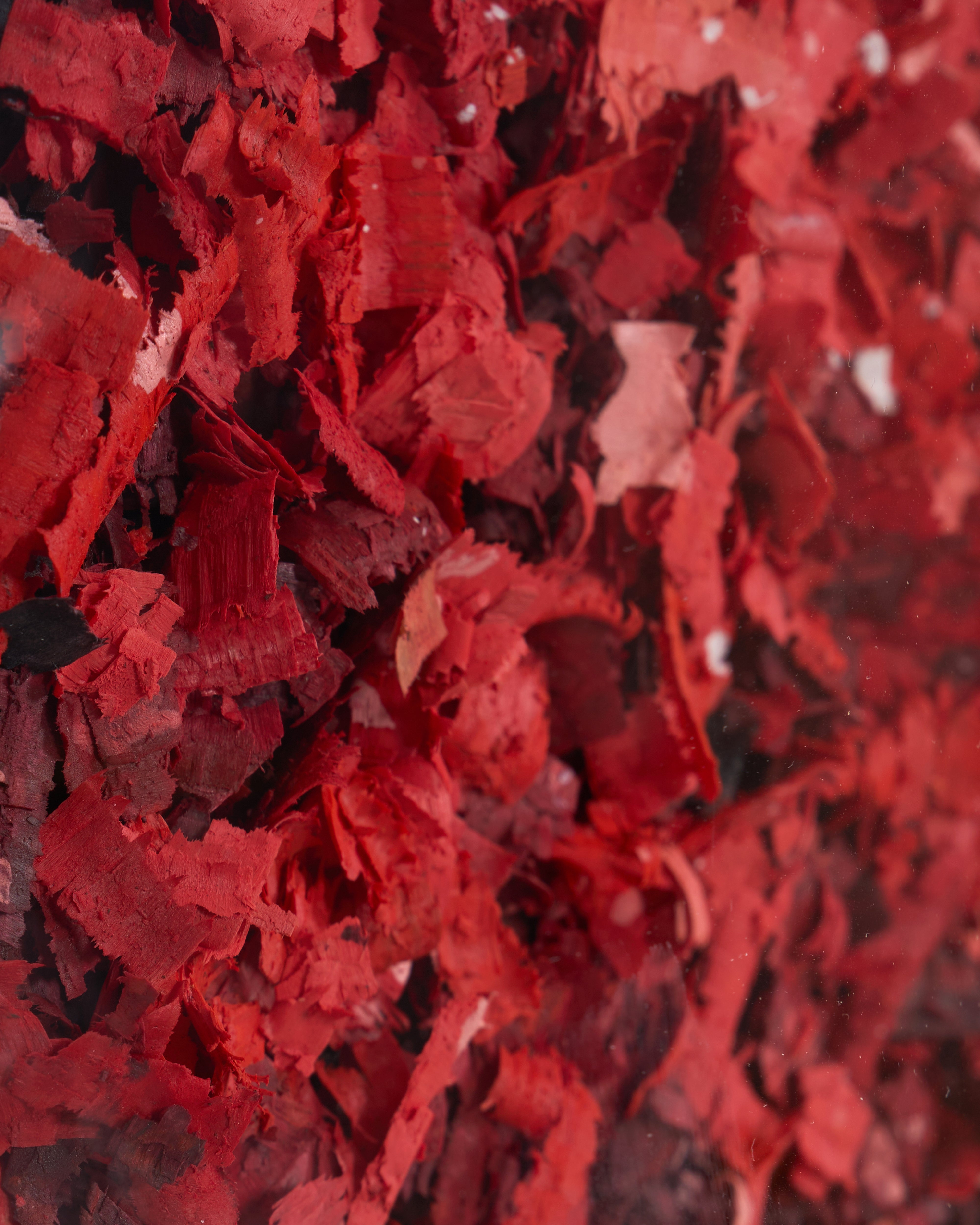 Close-up of red fabric with a textured pattern