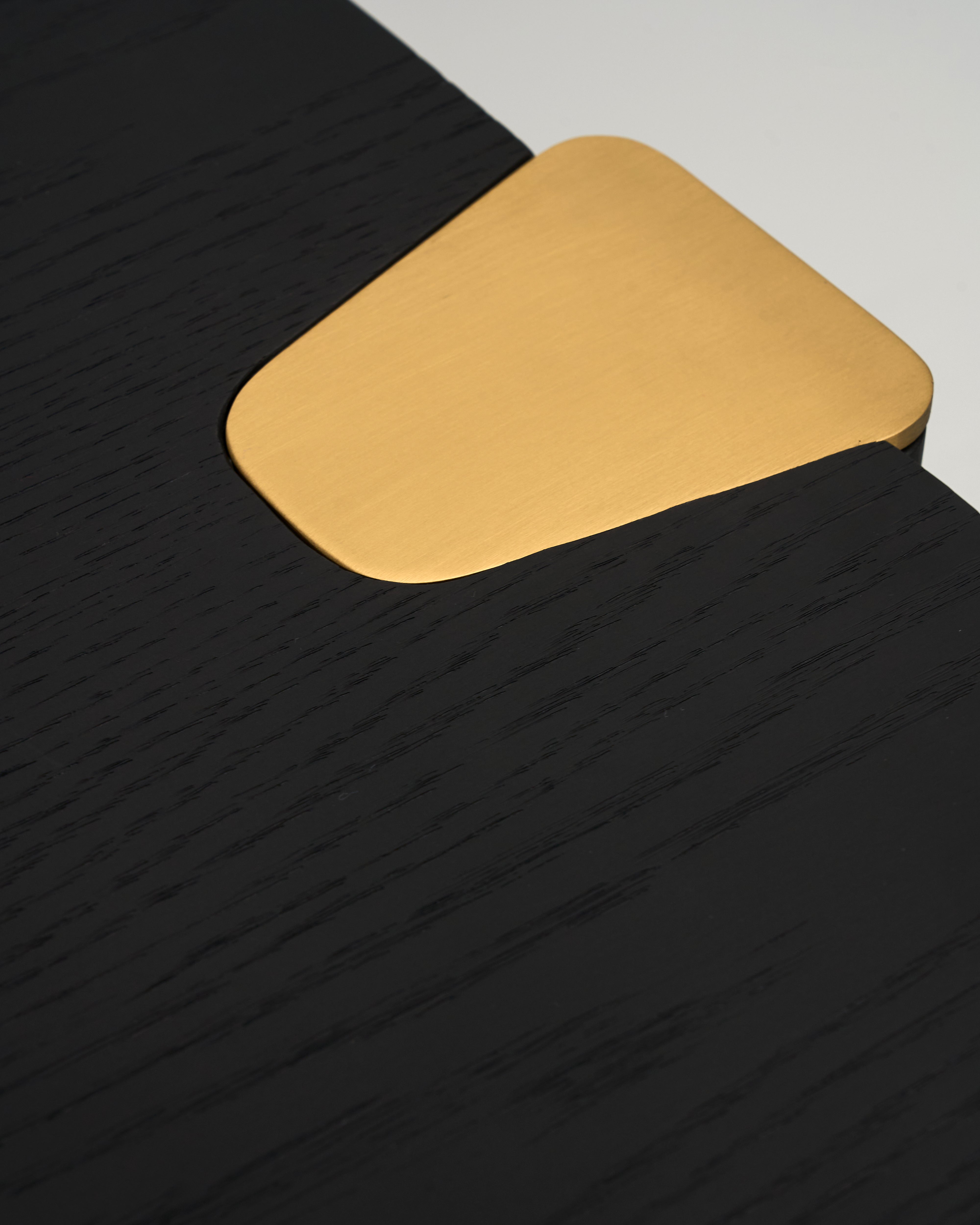 Close-up of Bonna Side Table detailing rich wood veneer texture and premium gold-finished steel base

