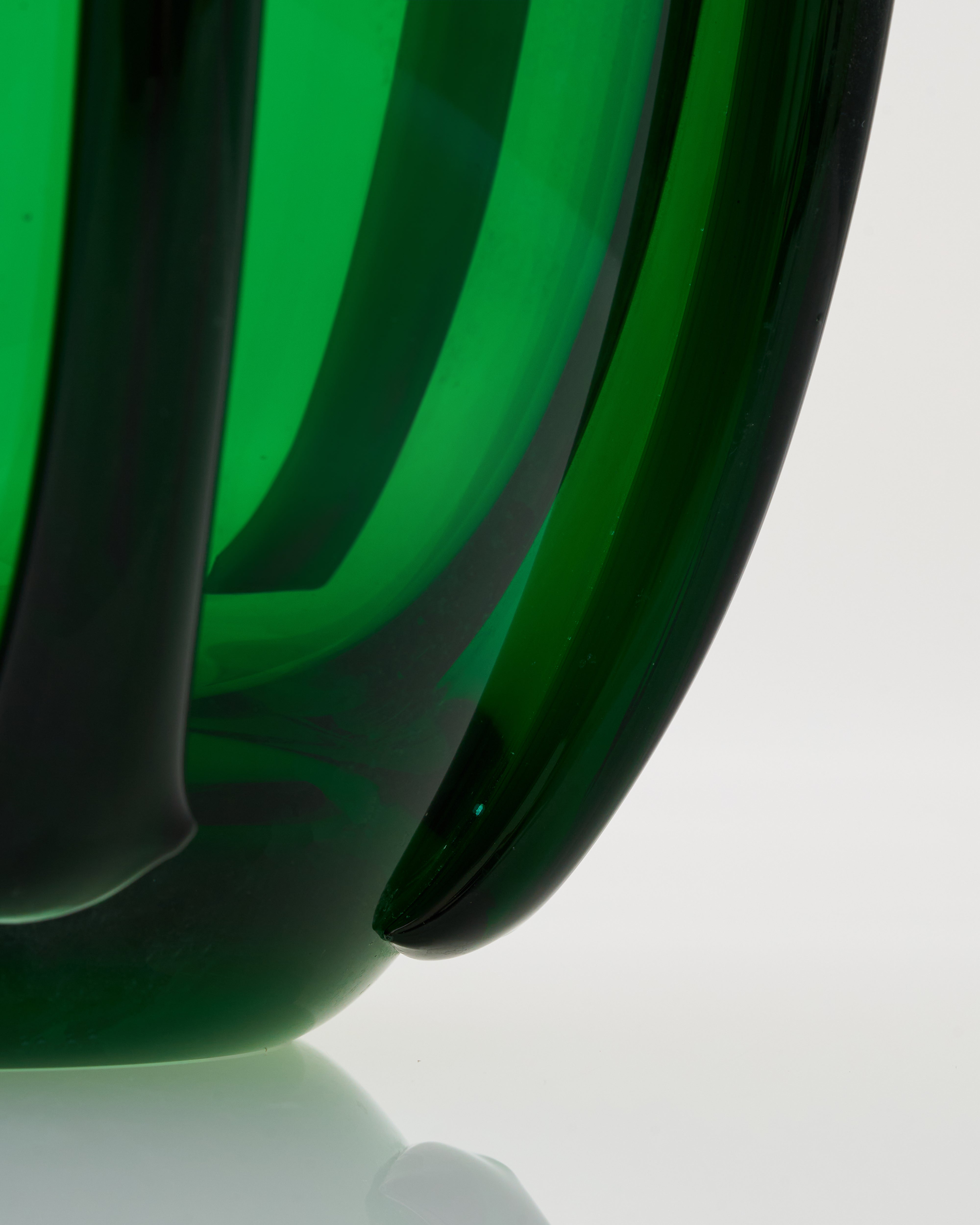 Detailed view of Drop Tail Modern Vase emphasizing sculptural curves and luxury glaze finish
