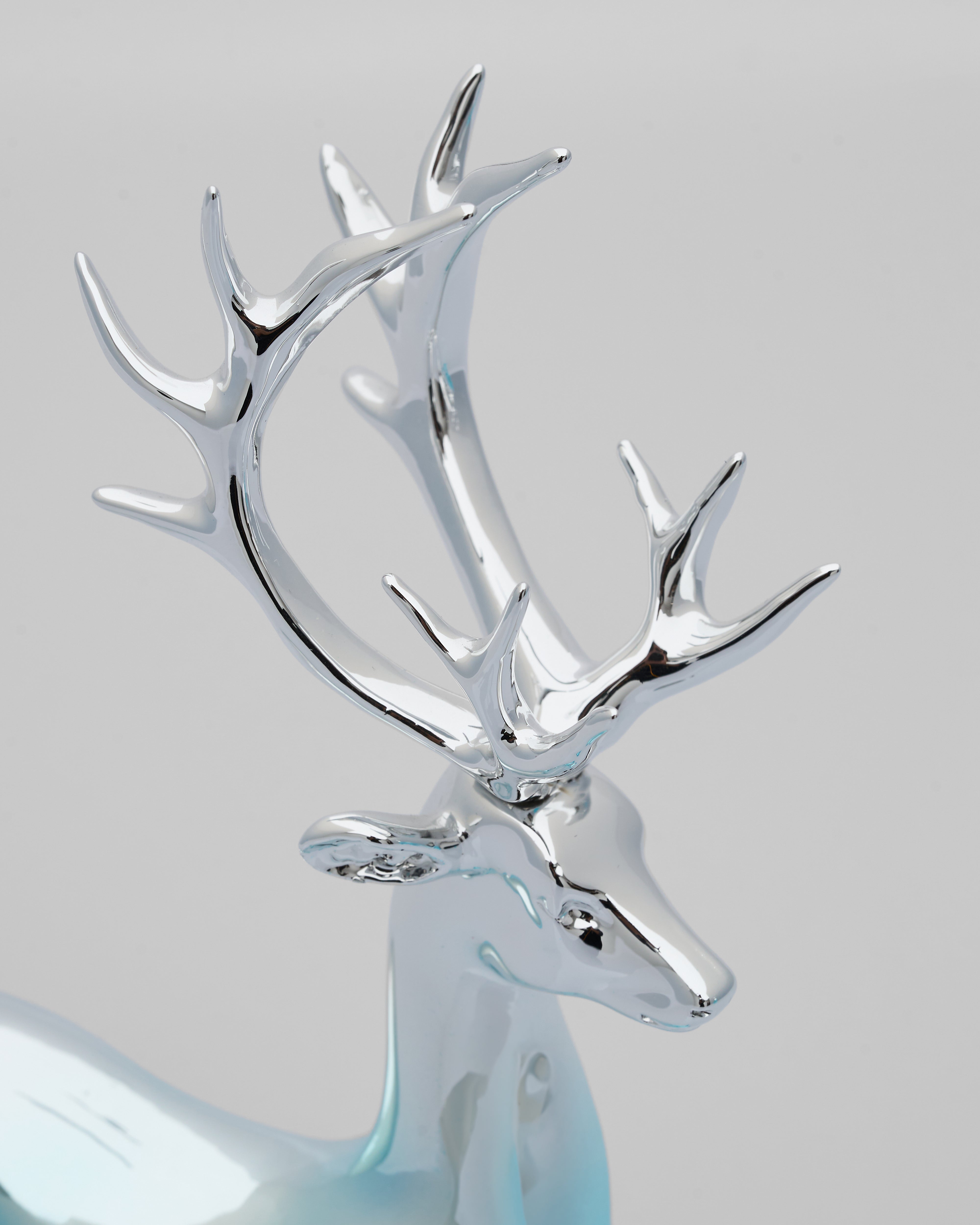 Detailed view of Dual Desert Deer Decor showcasing deer motifs and refined sculptural elements
