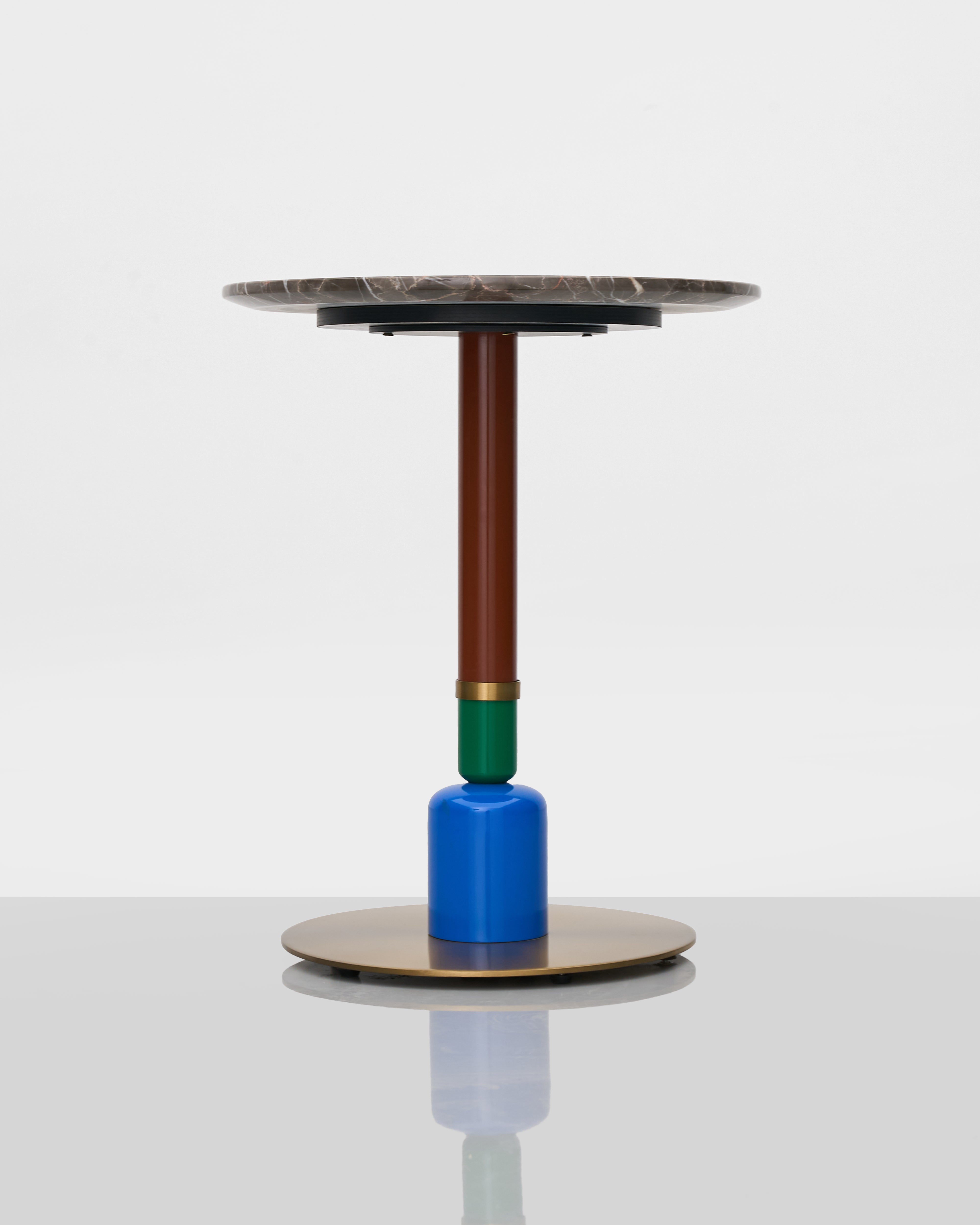 Side view of Elle Pillar Side Table highlighting sleek single-rod design and functional tabletop
